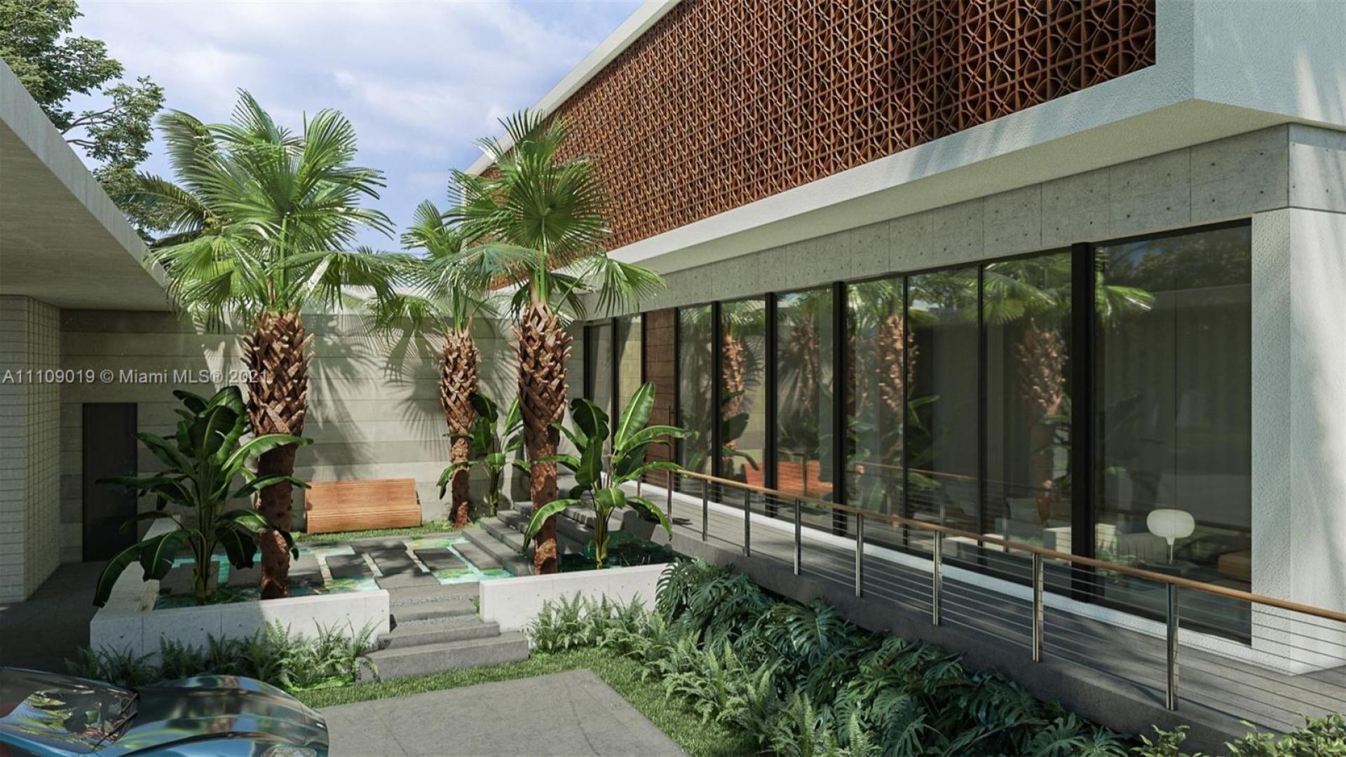 Luxurious Miami bayfront villa with pool and dock, for sale at 11420 N Bayshore Dr