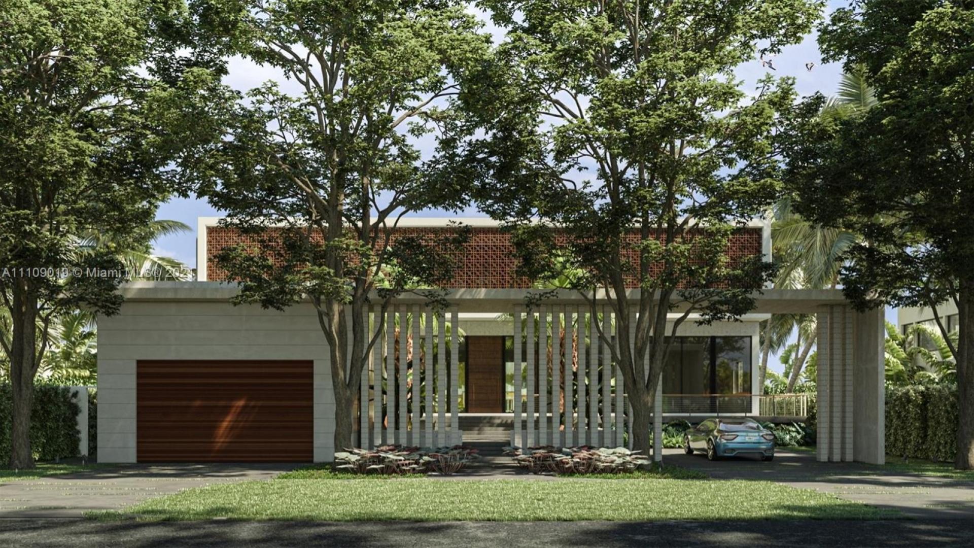Luxury Miami villa entrance with palm trees and modern architecture at 11420 N Bayshore Dr