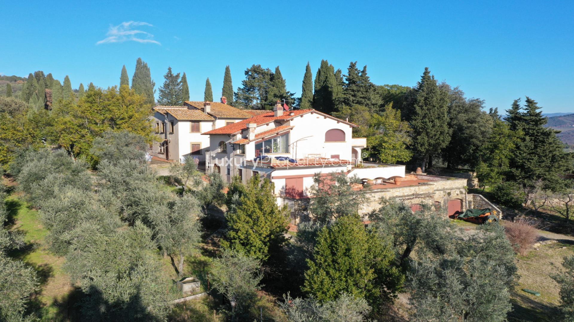 Villa Aurora Fiorentina in Florence, surrounded by lush greenery and scenic landscape
