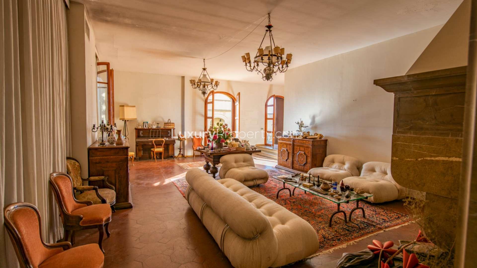 Charming Villa Aurora Fiorentina in Florence's serene landscape, surrounded by lush greenery
