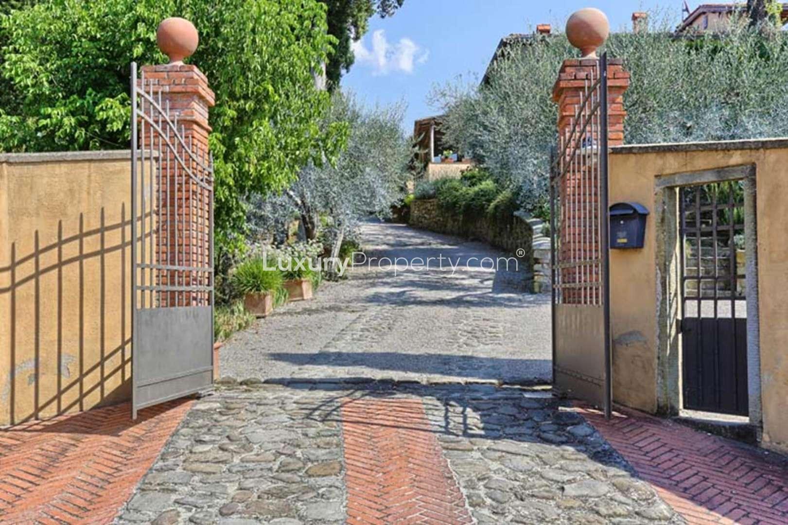 Aerial view of Tuscan villa with pool in Arezzo, lush gardens, Villa Donna Elena