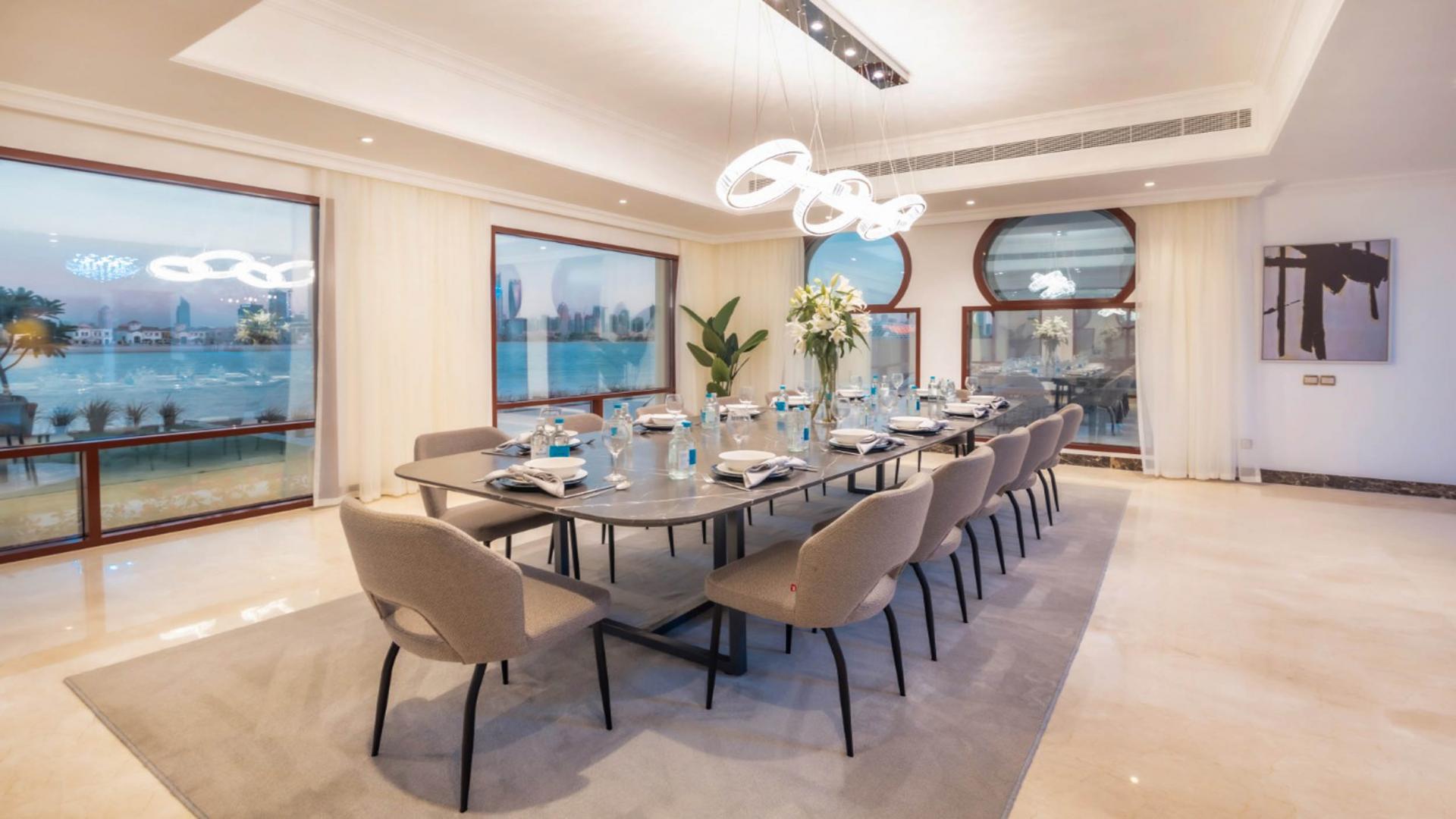 Luxurious living room in Palm Jumeirah Signature Villa with elegant furnishings and modern decor