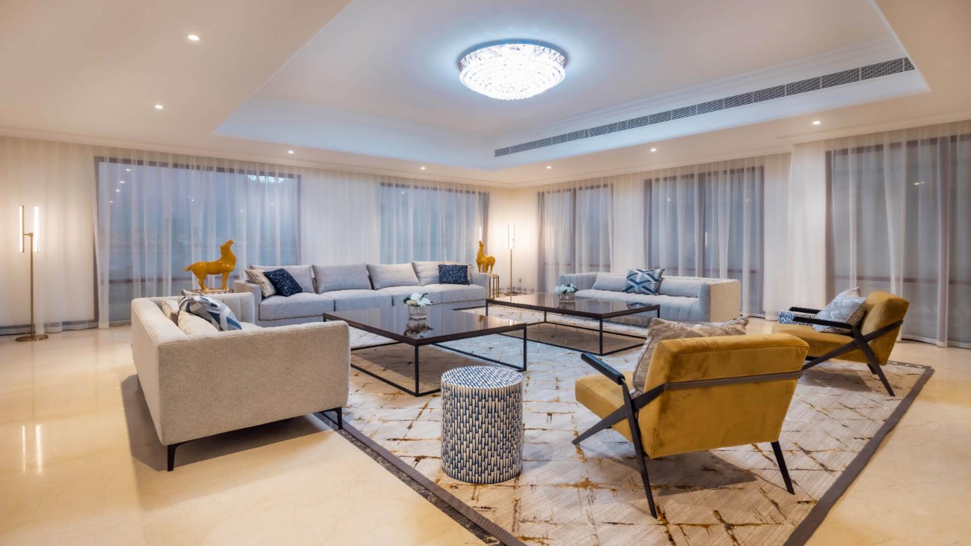Luxury living room in 8-bedroom villa, Palm Jumeirah, with elegant decor and sea views