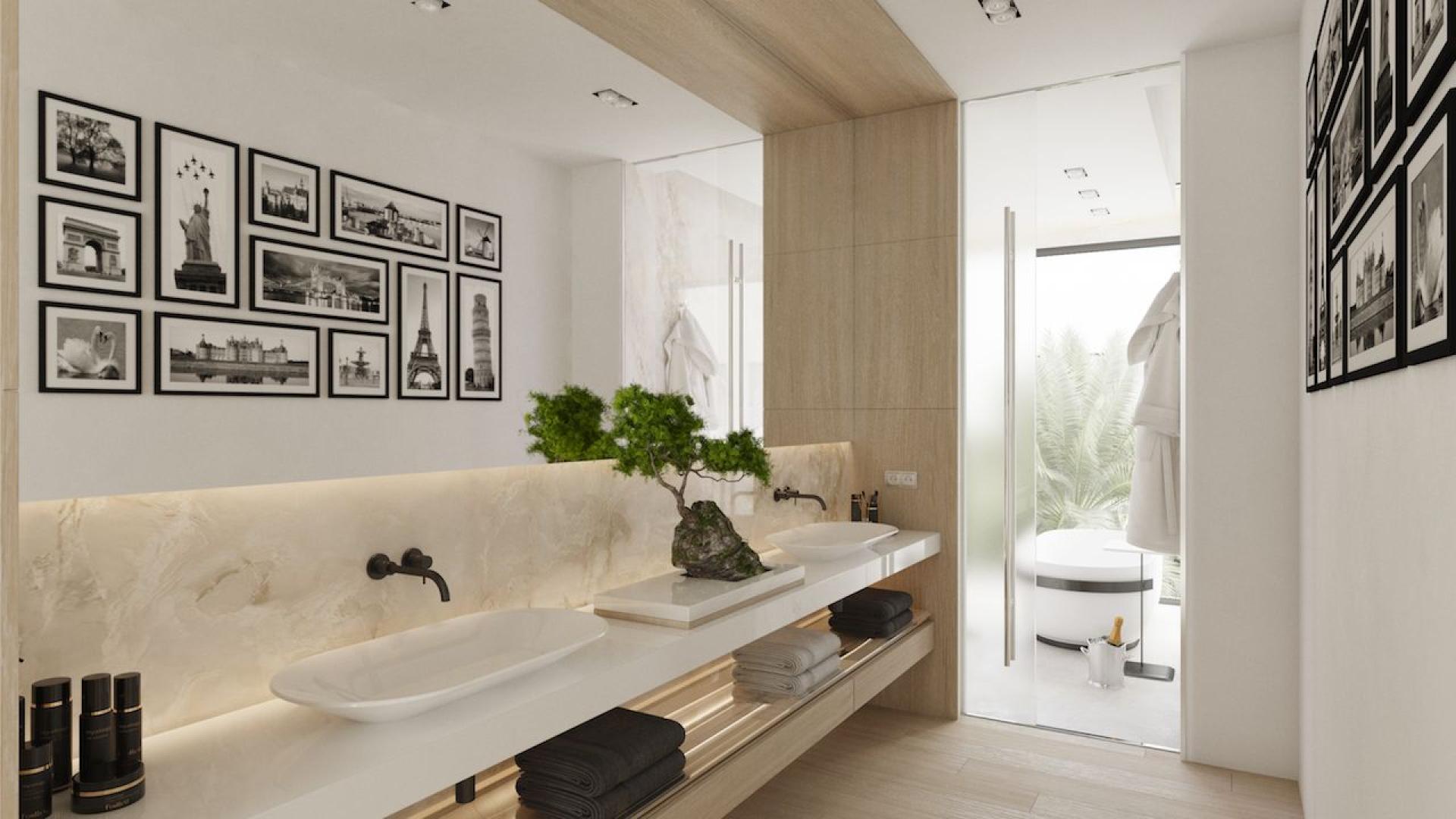 Luxury villa garage with sports cars and motorcycle in Marbella, Málaga, for sale