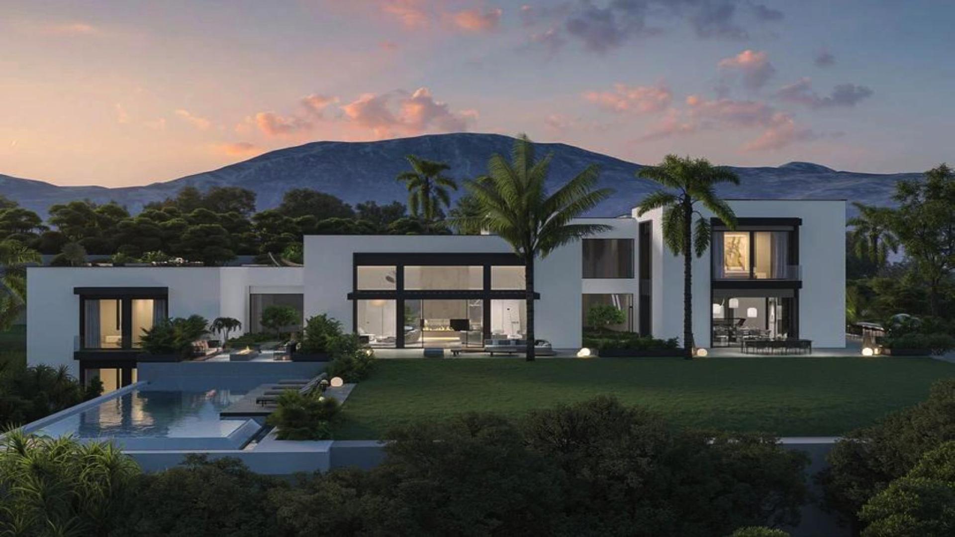 Elegant seven-bedroom villa with panoramic sea views in Marbella, surrounded by lush greenery