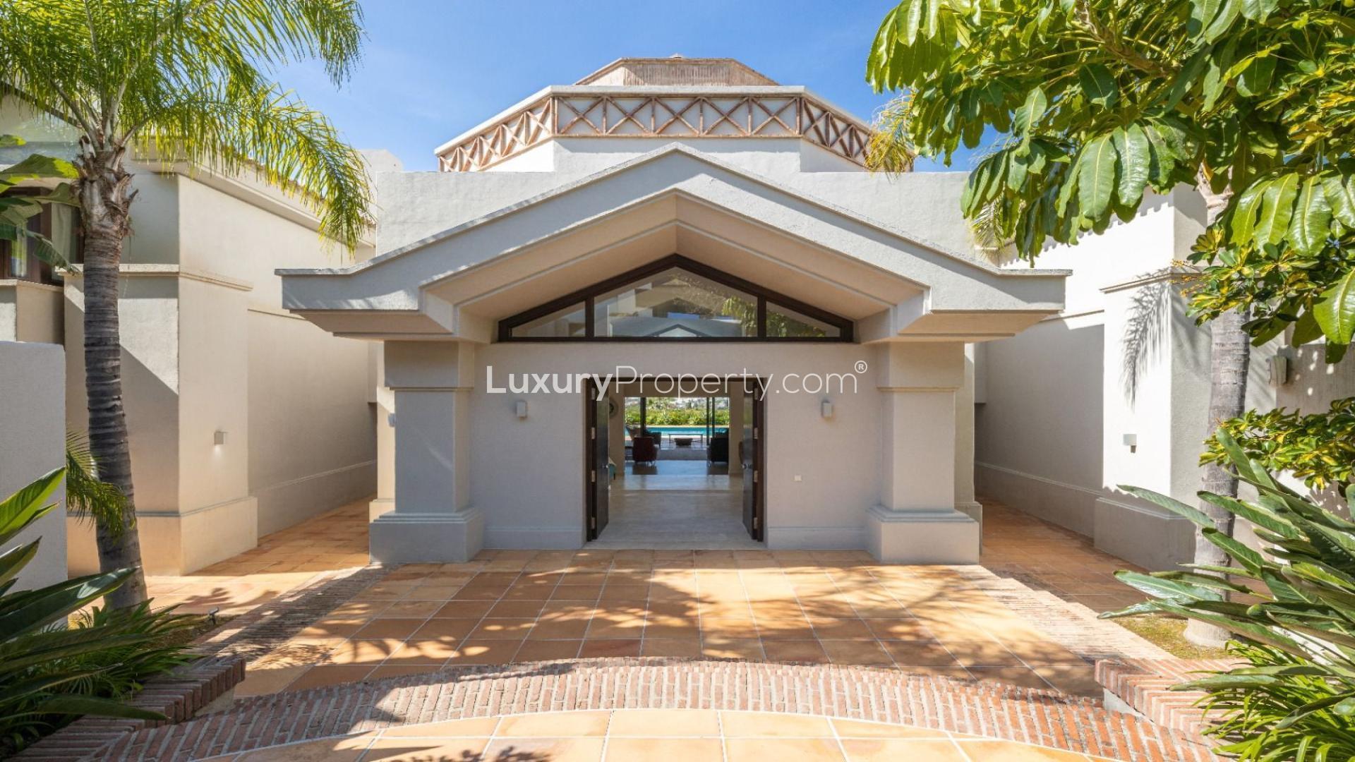 Luxury villa in Los Flamingos, Benahavis with pool, panoramic sea, and golf views