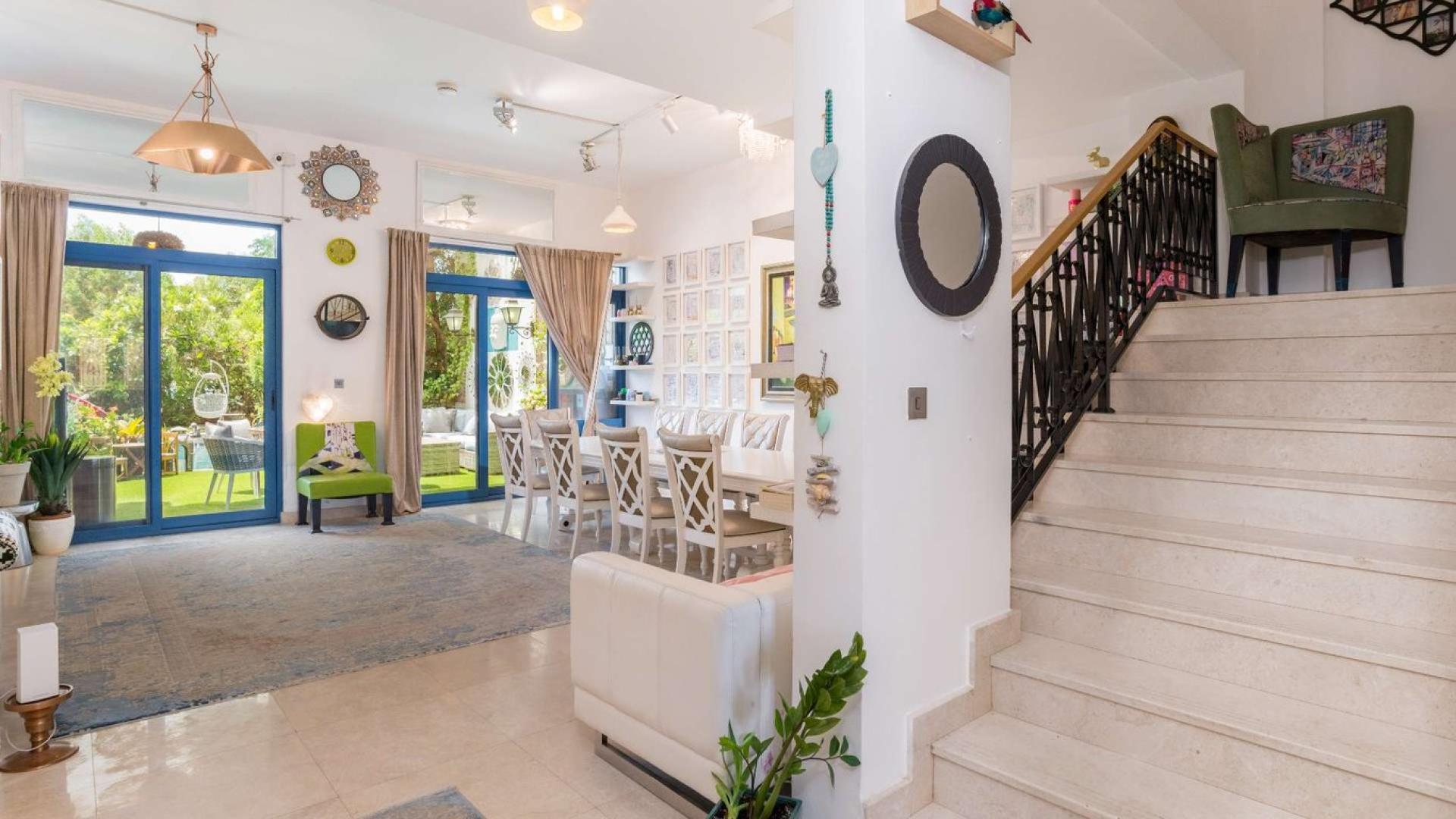 Living room with modern art in Palm Jumeirah townhouse for sale