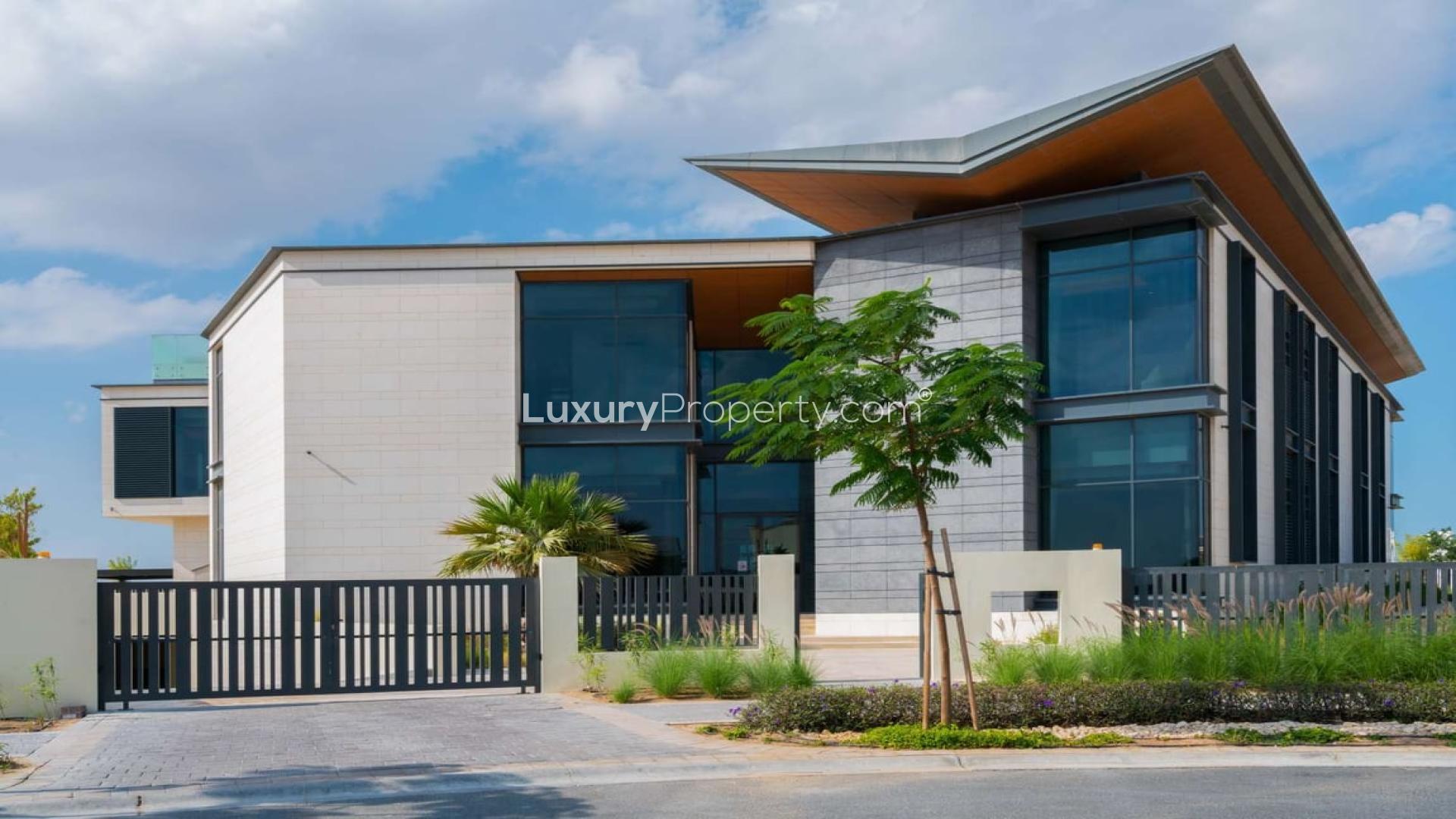 Spacious dining area in luxury 9-bedroom villa, Dubai Hills View, with modern design elements