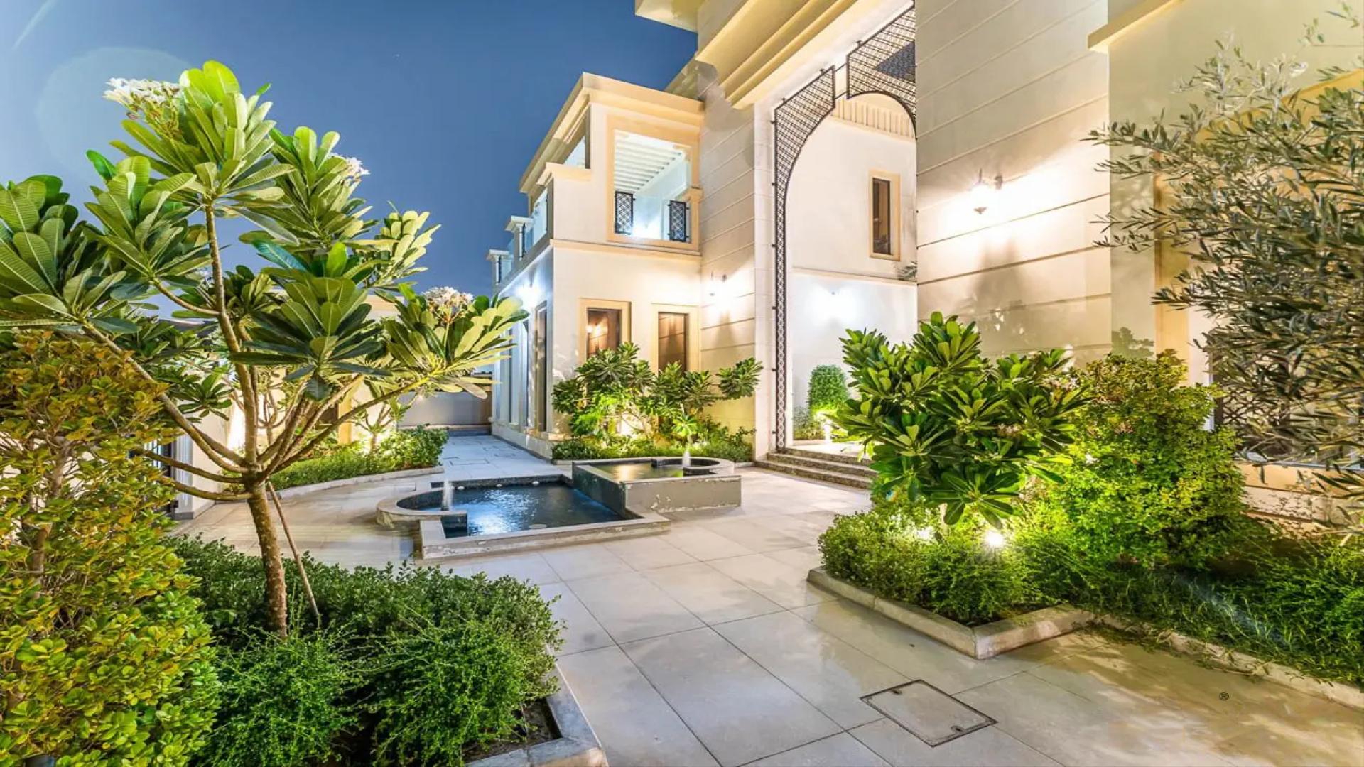 Luxurious 9-bedroom mansion exterior at night, Dubai Hills View, Dubai Hills Mansions