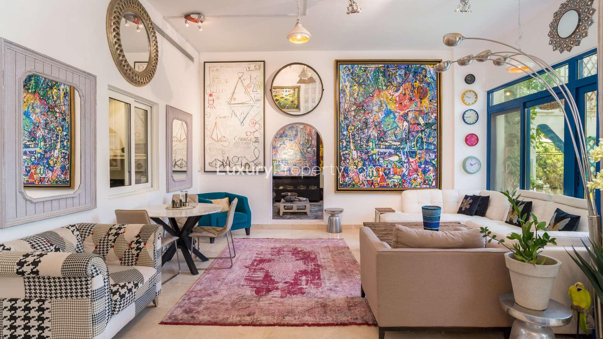 Interior of spacious townhouse in Palma Residences, with garden view and elegant decor