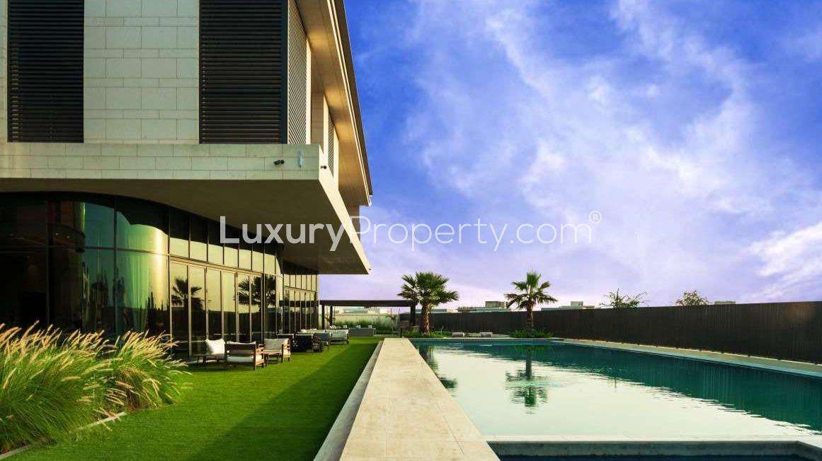 Luxurious 9-bedroom villa exterior in Dubai Hills View, modern architecture, gated entrance