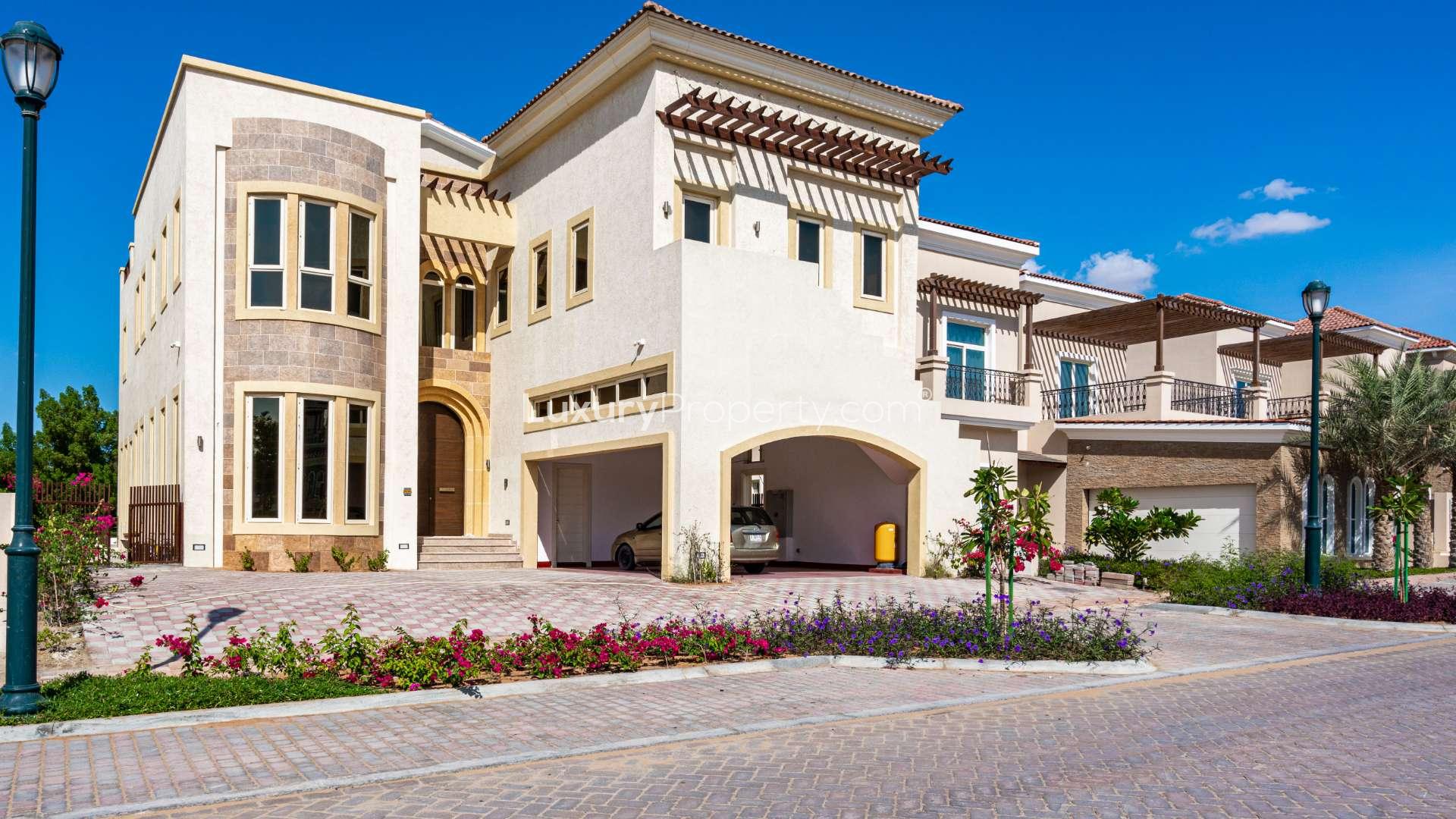 Modern kitchen in Jumeirah Golf Estates villa, featuring sleek cabinetry and contemporary design