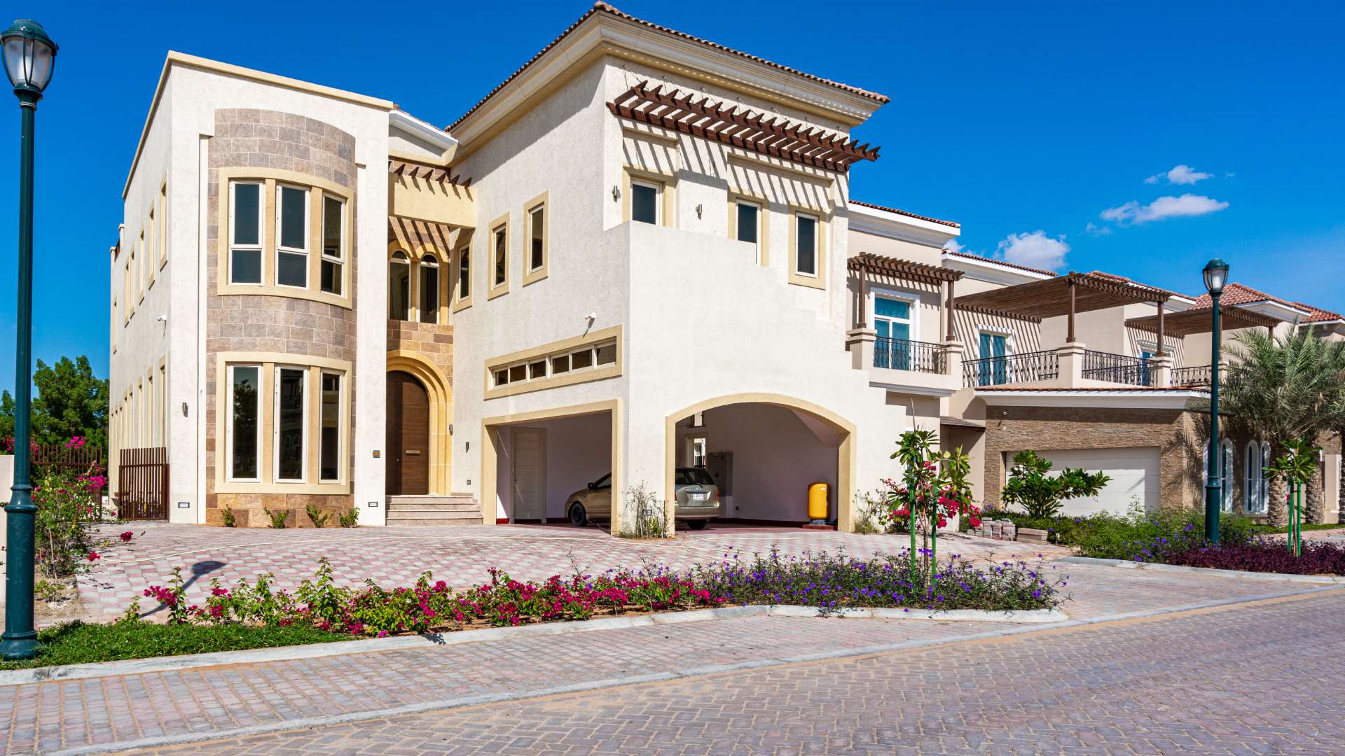 Modern kitchen in Jumeirah Golf Estates villa, featuring sleek cabinetry and contemporary design