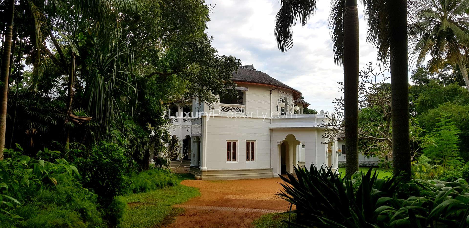 Aerial view of 9-bedroom villa with pool in lush Pasyala, Sri Lanka landscape