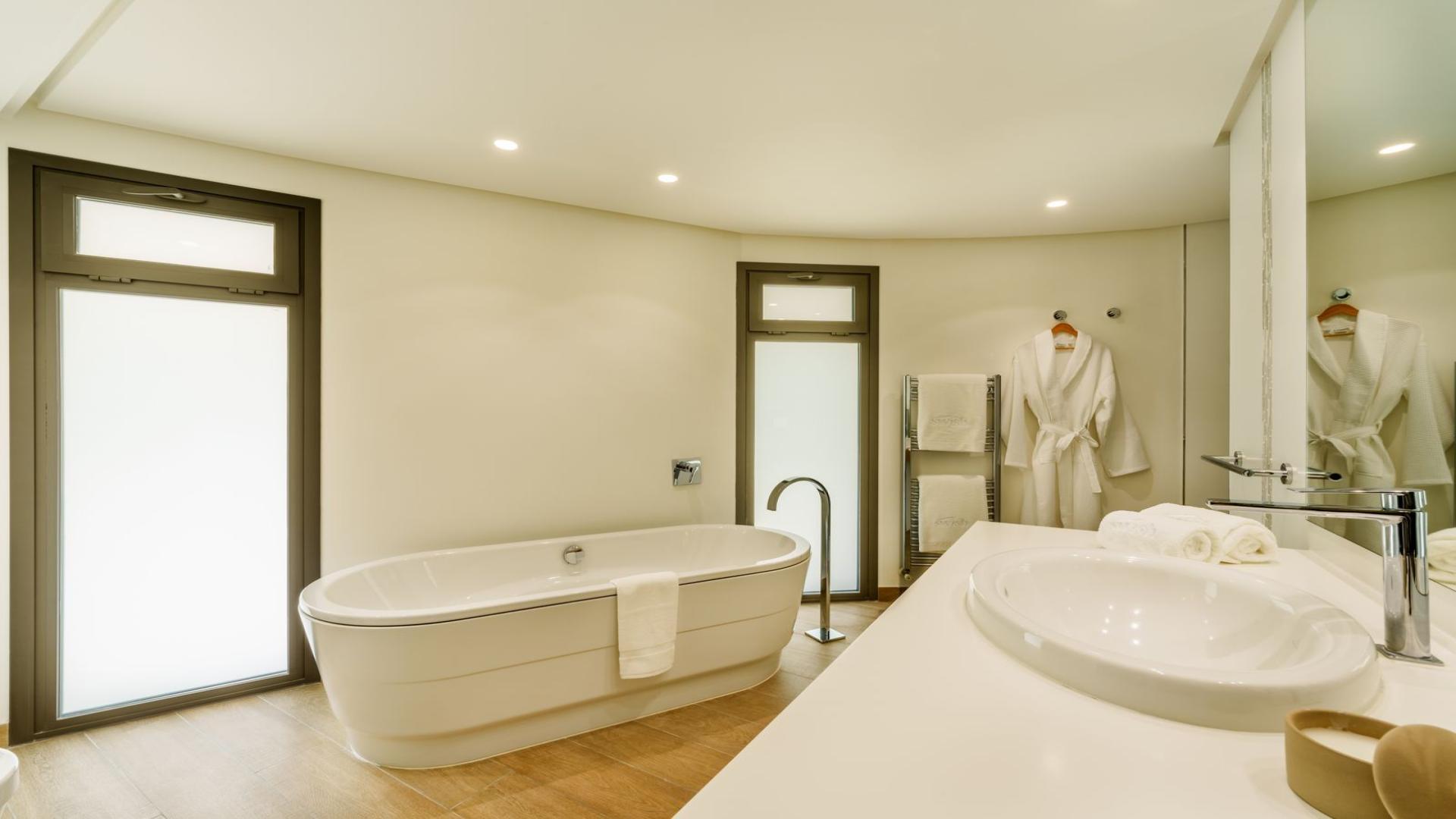 Modern kitchen in luxury villa, La Cerquilla, Nueva Andalucía, Marbella, with garden view