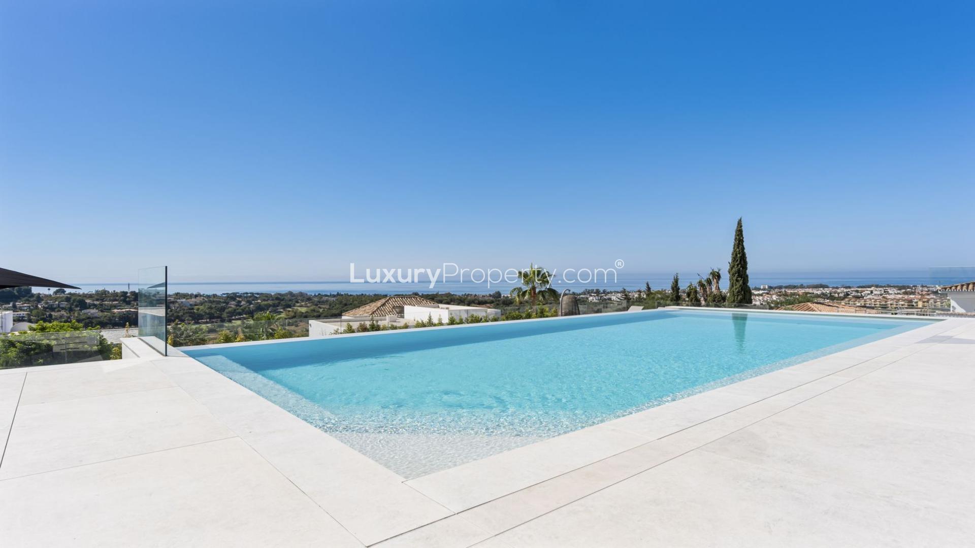 Luxurious villa patio with infinity pool and ocean view in El Paraiso, Málaga