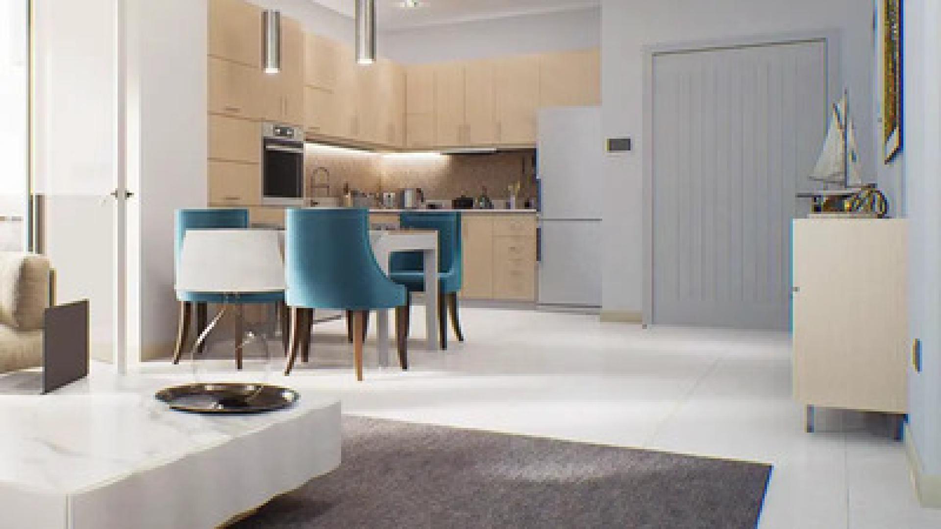 Modern studio kitchen and dining area in Golf Views Seven City, JLT apartment for sale