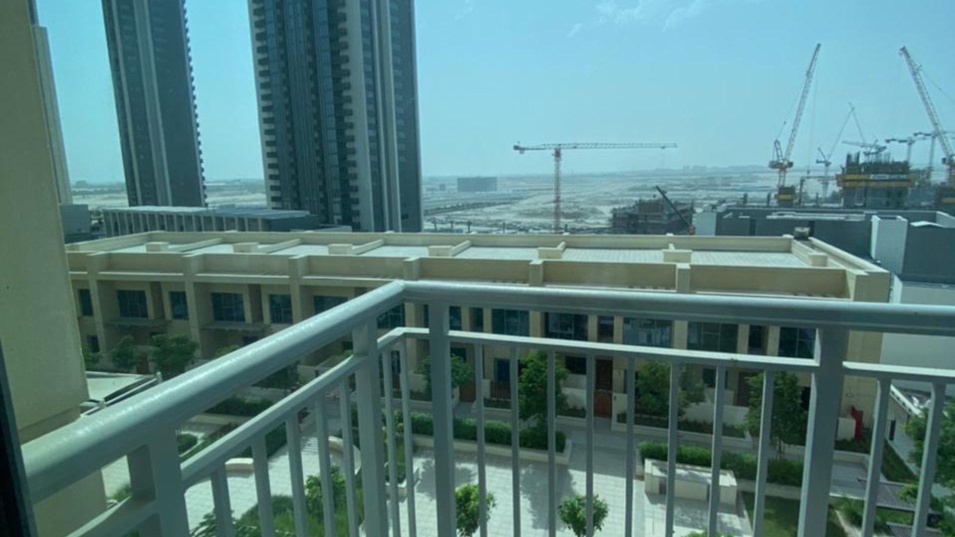 View from 2-bedroom apartment in Harbour Views 1, Dubai Creek Harbour, showing surrounding buildings