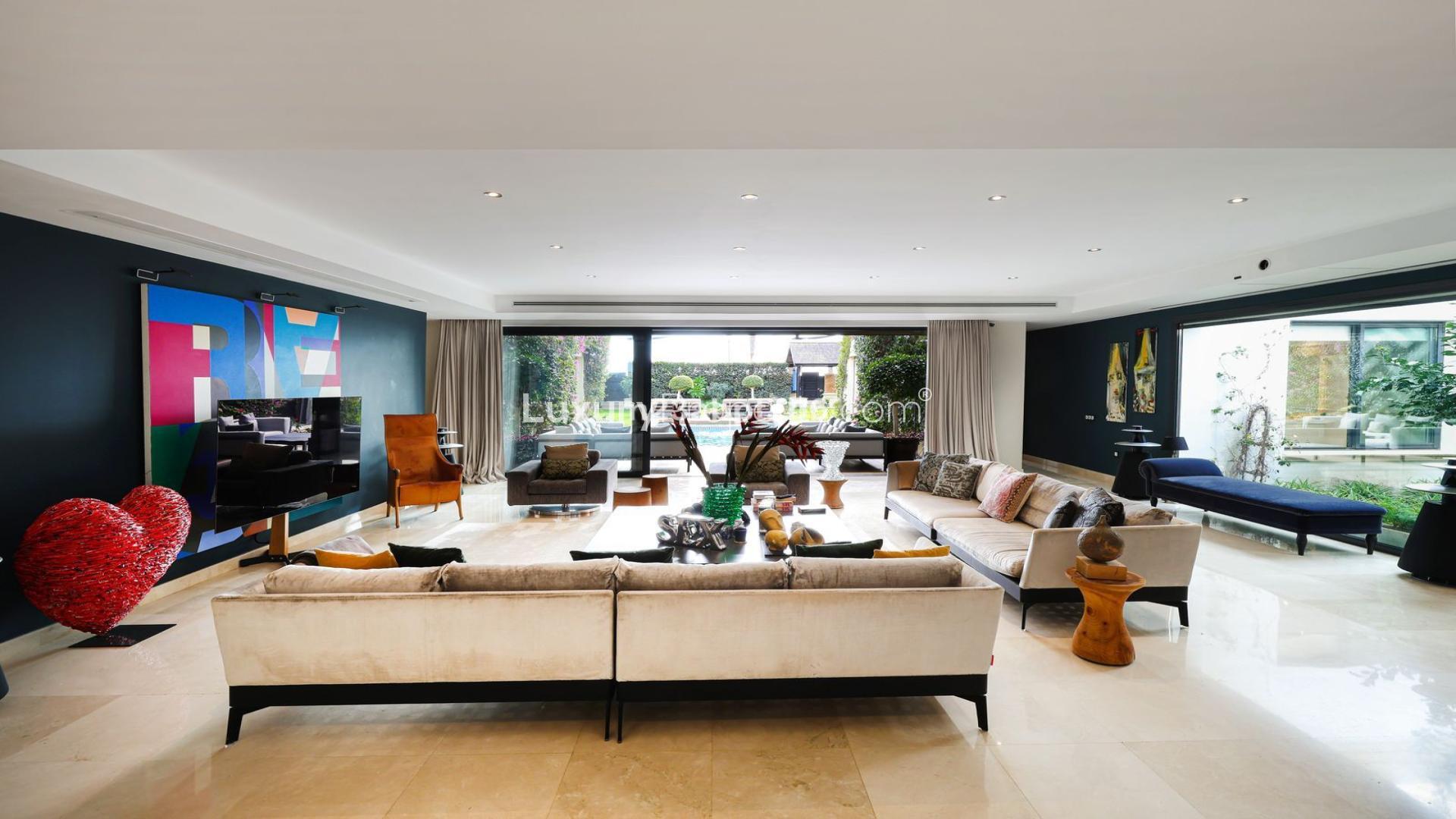 Luxurious living room in beachfront 4-bed villa, Costa del Sol, with pool view