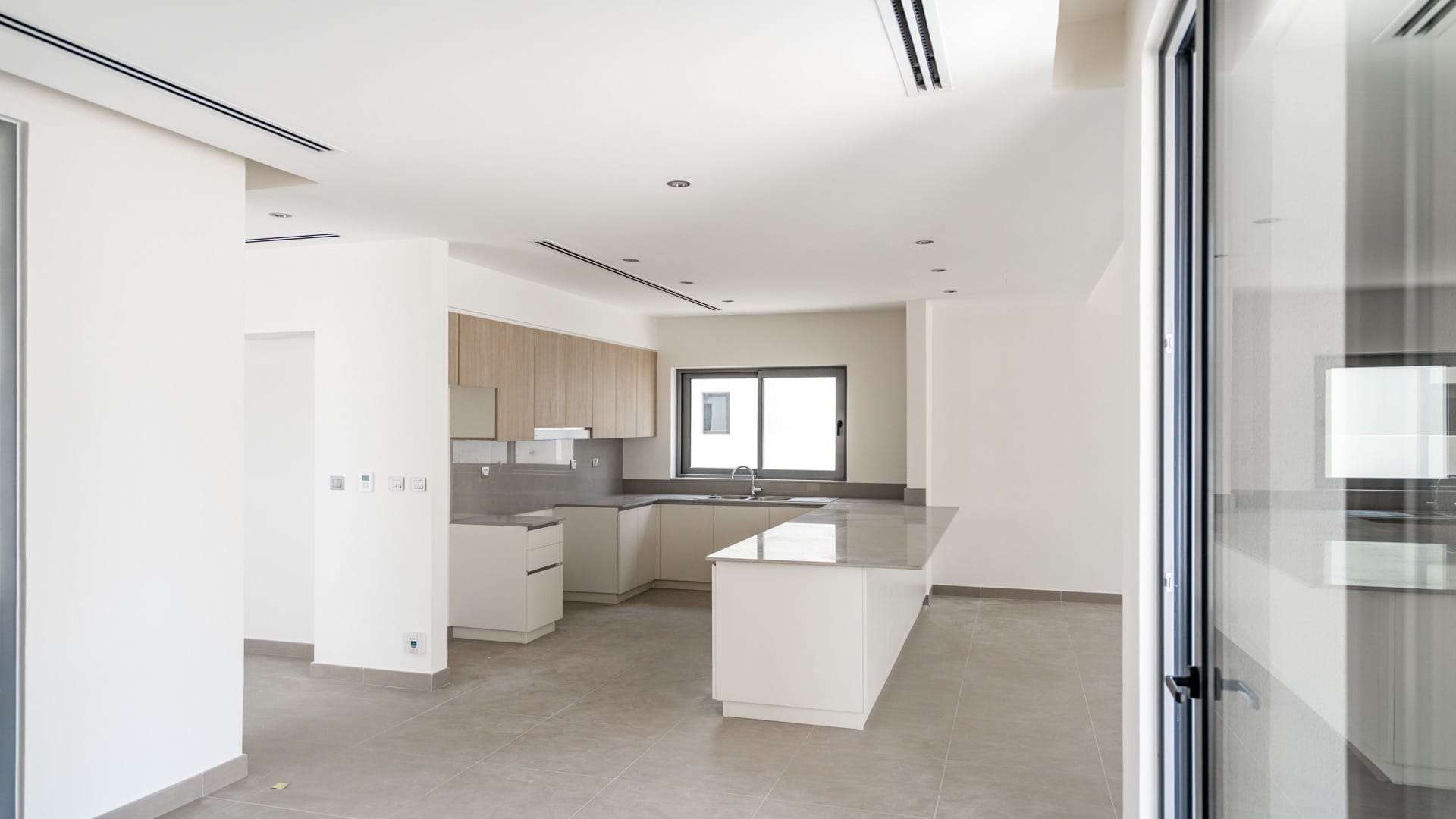 Contemporary kitchen in E1 style villa at Sidra Phase 3, Dubai Hills Estate