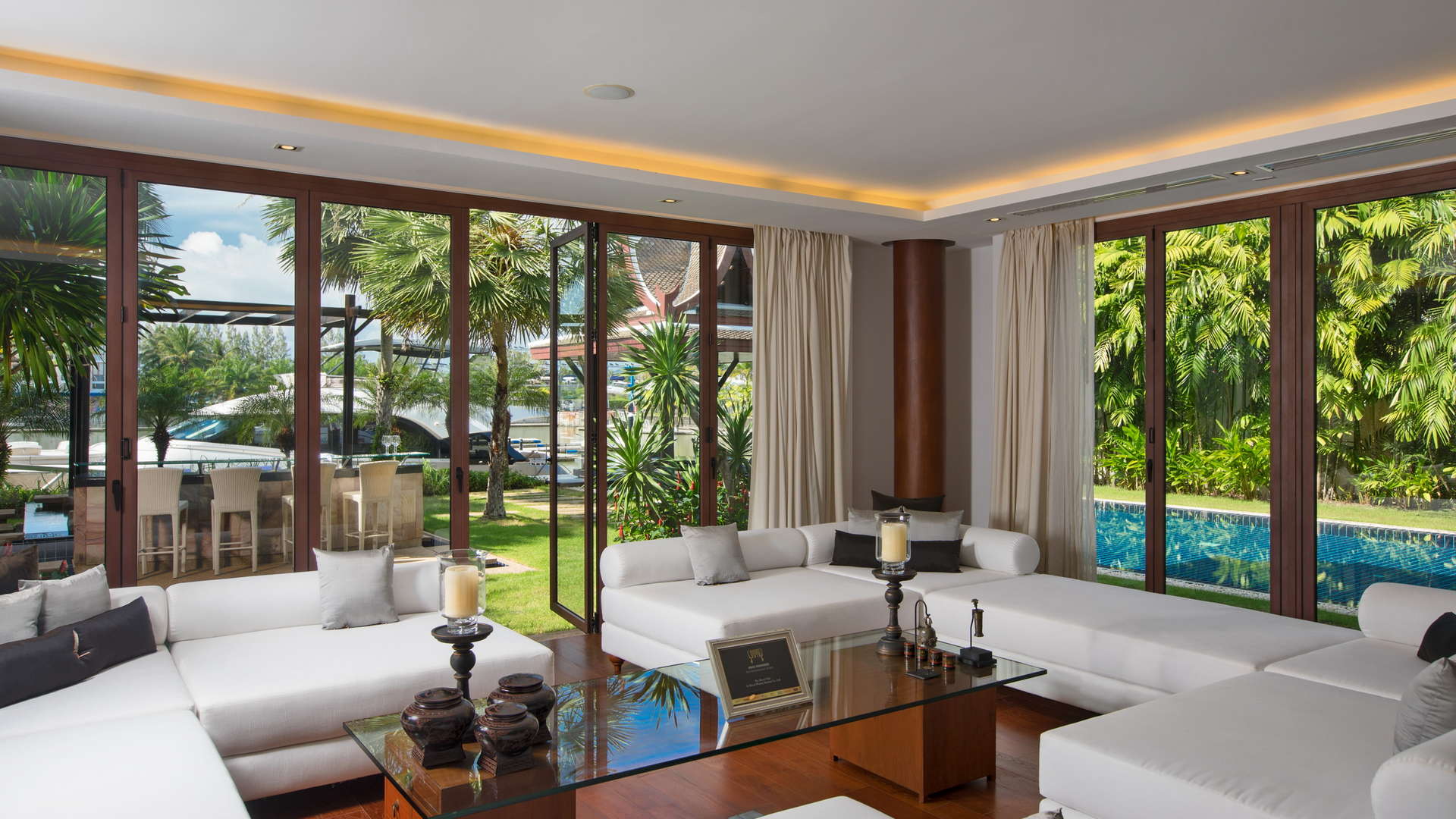 Luxurious living room in 5-bedroom villa, Royal Phuket Marina, with pool view