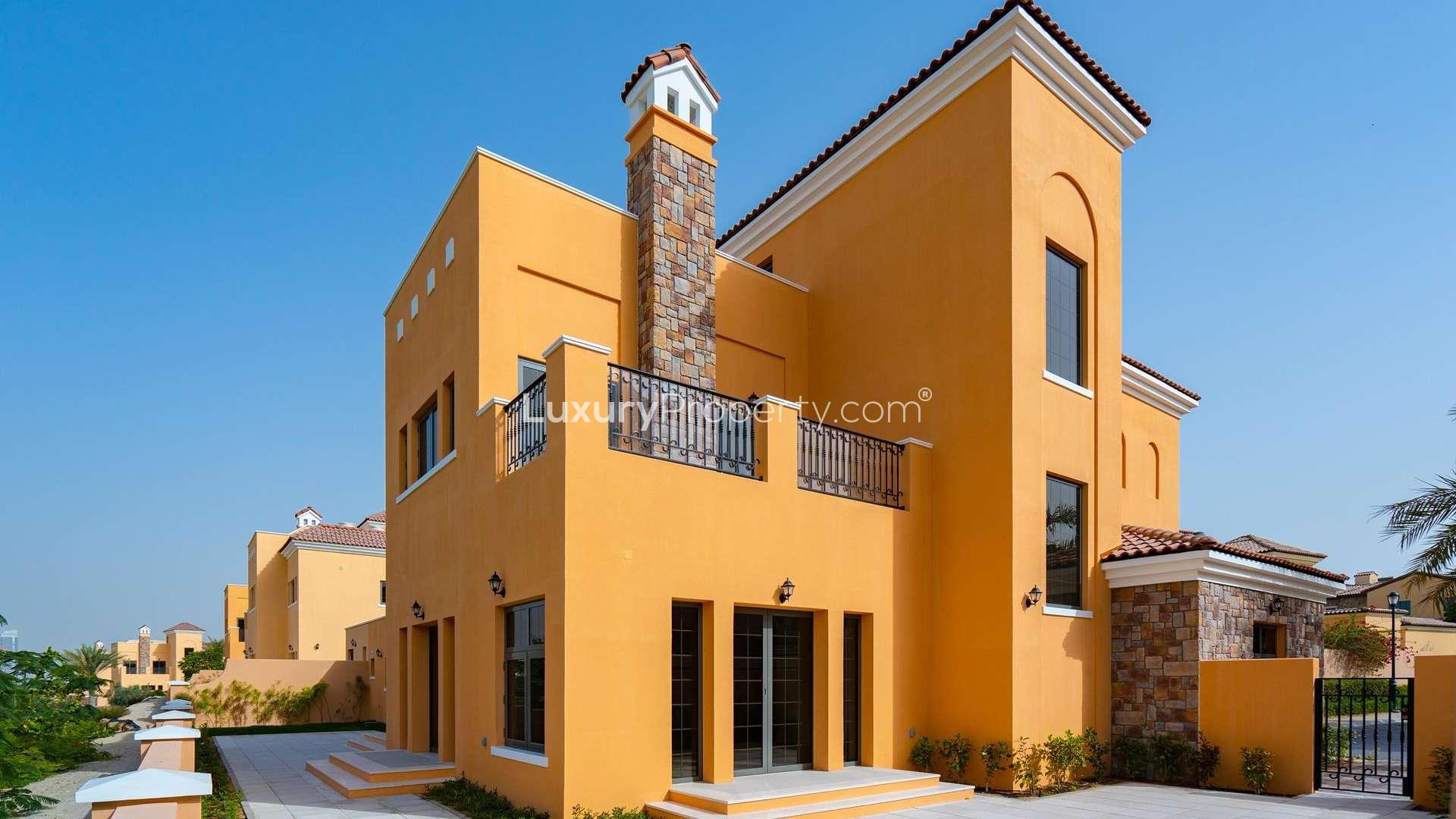 Newly built 4-bedroom villa exterior in Whispering Pines, Jumeirah Golf Estates, Earth community
