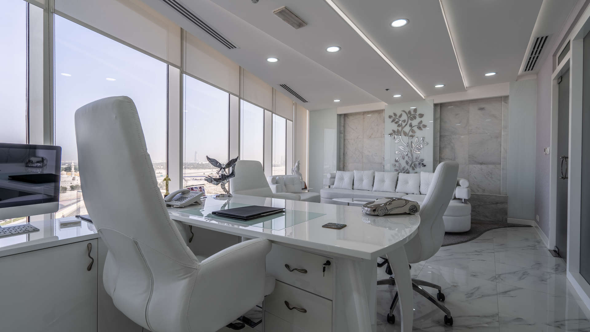 Modern office interior with panoramic city views in Crystal Tower, Business Bay