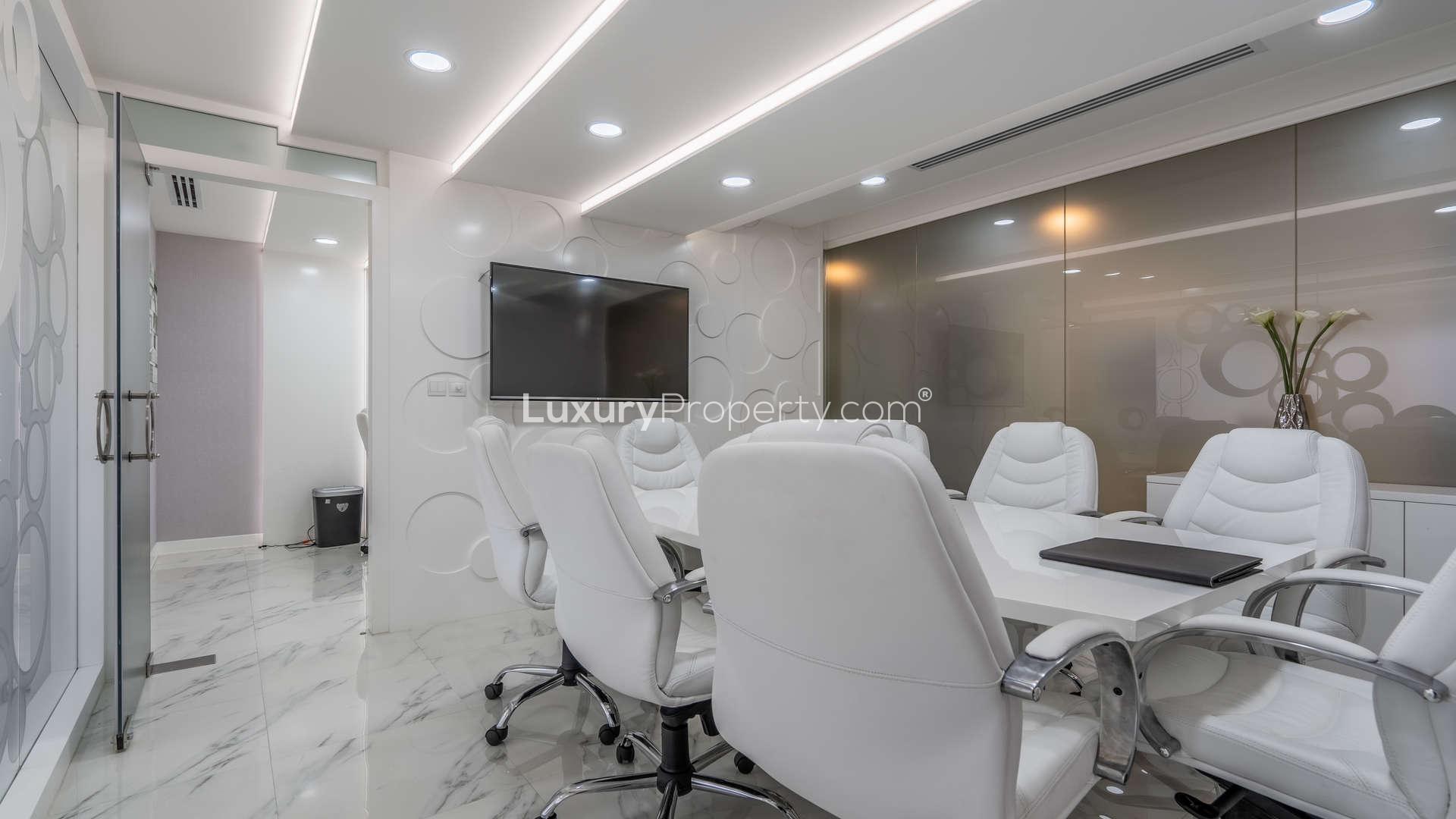 Modern office interior in Crystal Tower, Business Bay with sleek furniture and large windows