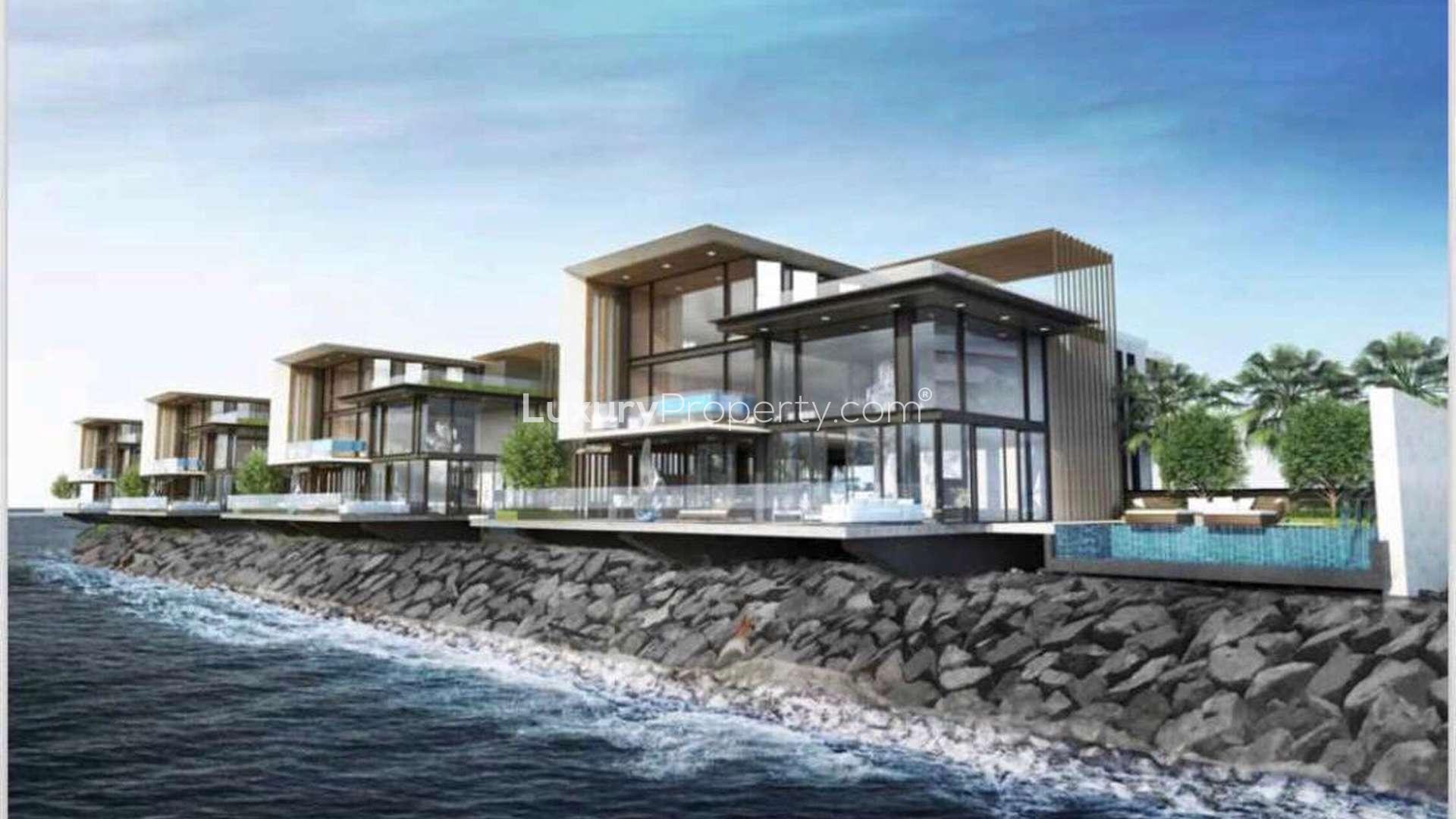 Aerial view of Marsa Al Arab, Dubai, near Quay Wall Villas, showcasing waterfront luxury