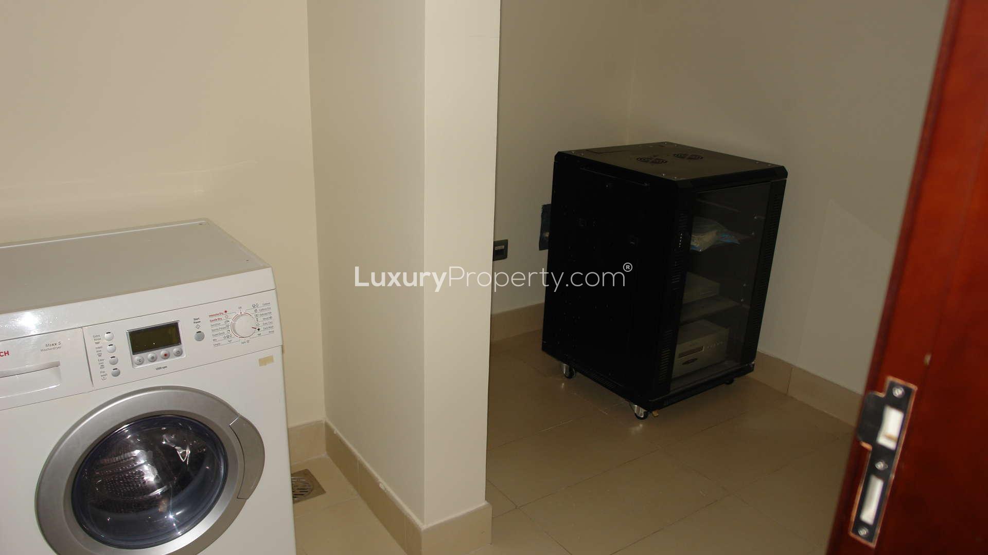 Luxury kitchen and living area in Tiara Residences apartment, Palm Jumeirah sea view