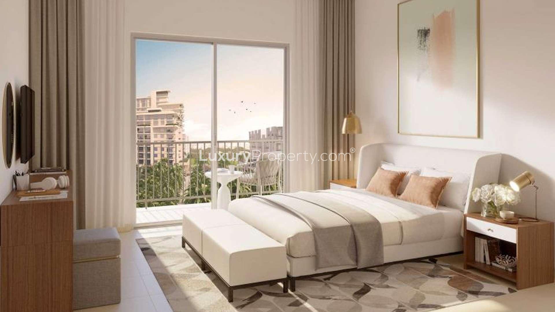 Modern living room in Rawda, Town Square apartment with balcony view, Dubai