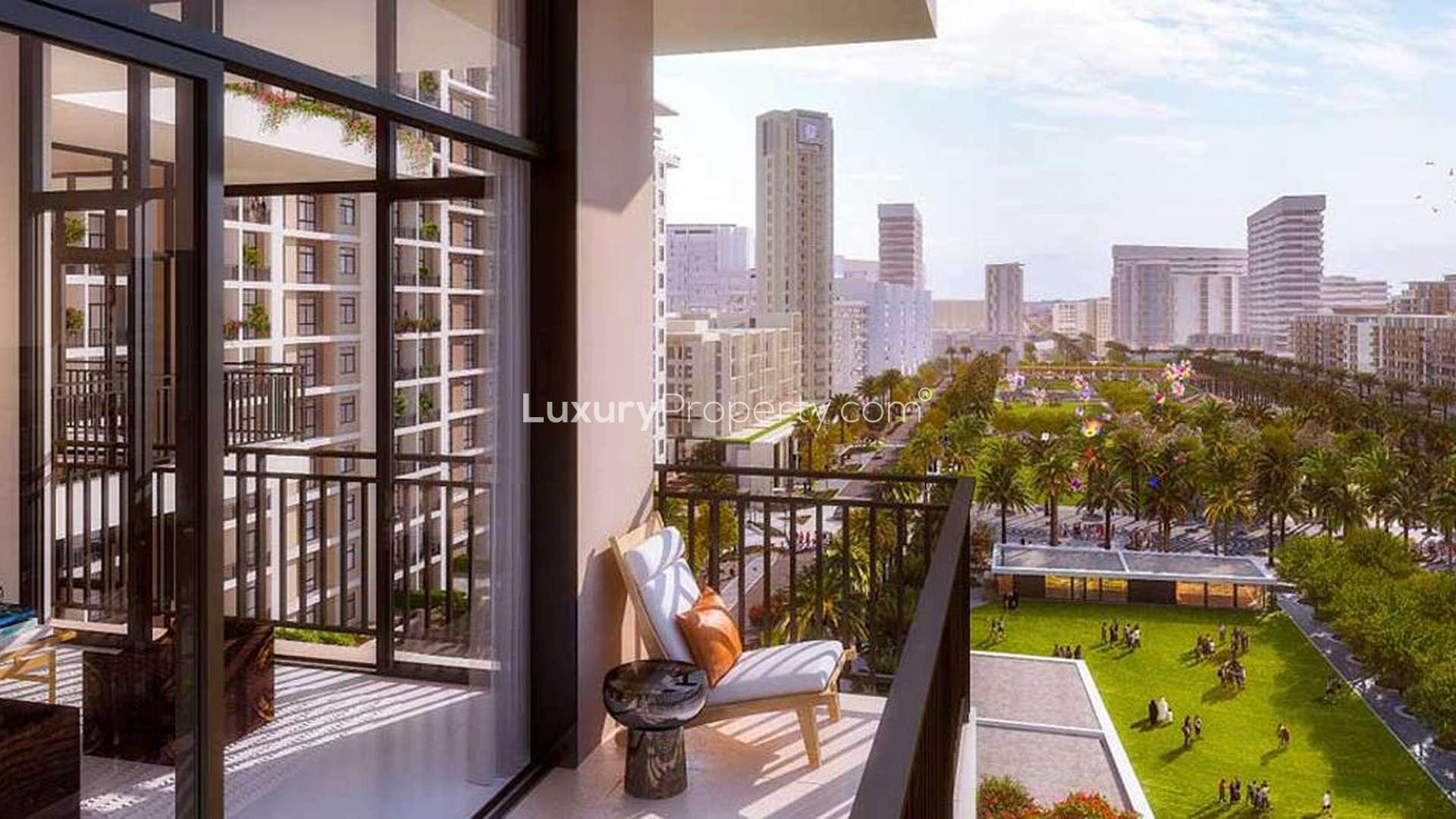 Modern bedroom with balcony view in one-bedroom apartment, Rawda, Town Square, Dubai