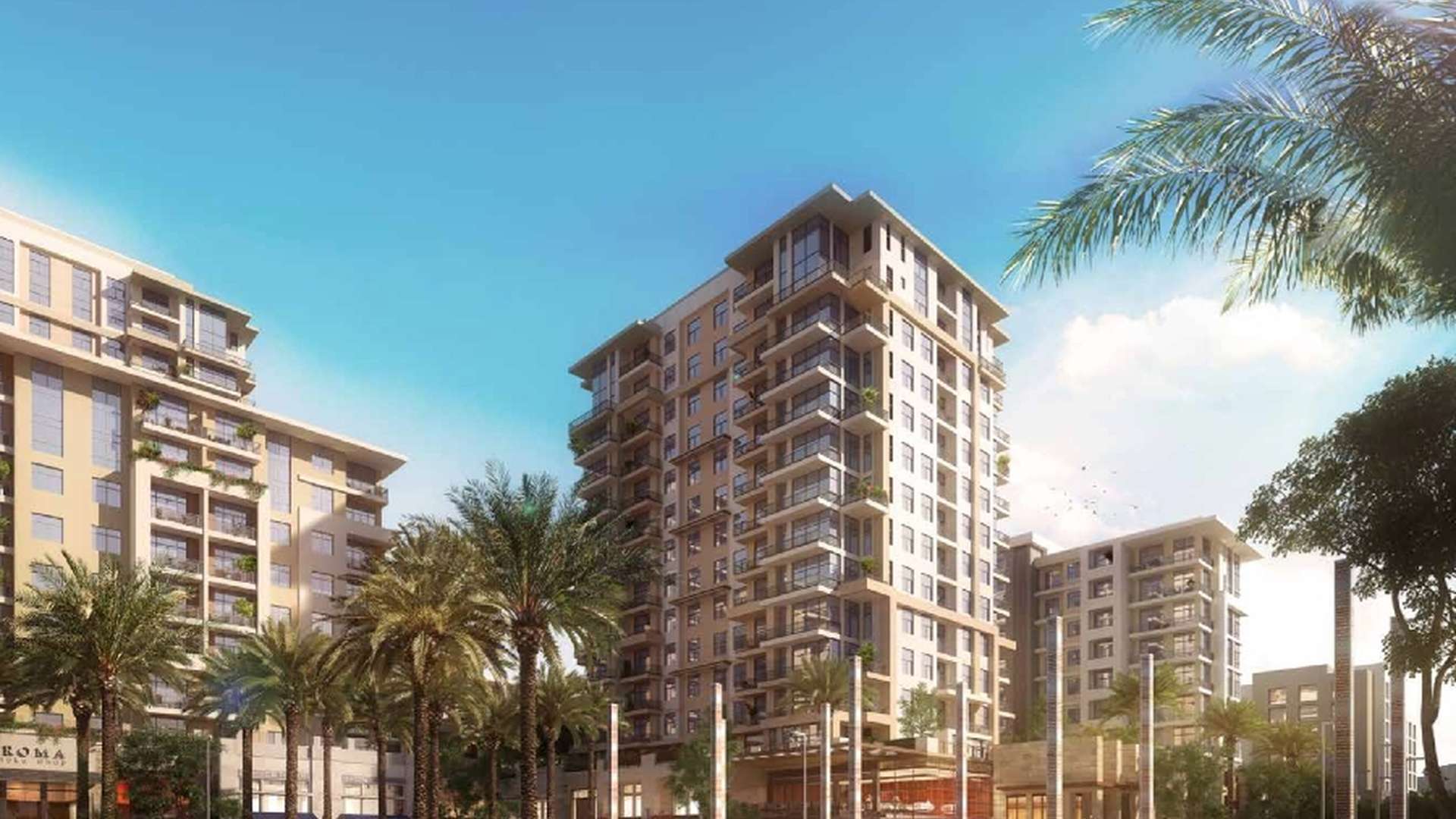 Stylish Jenna Apartments exterior at Dubai Town Square with palm-lined street view