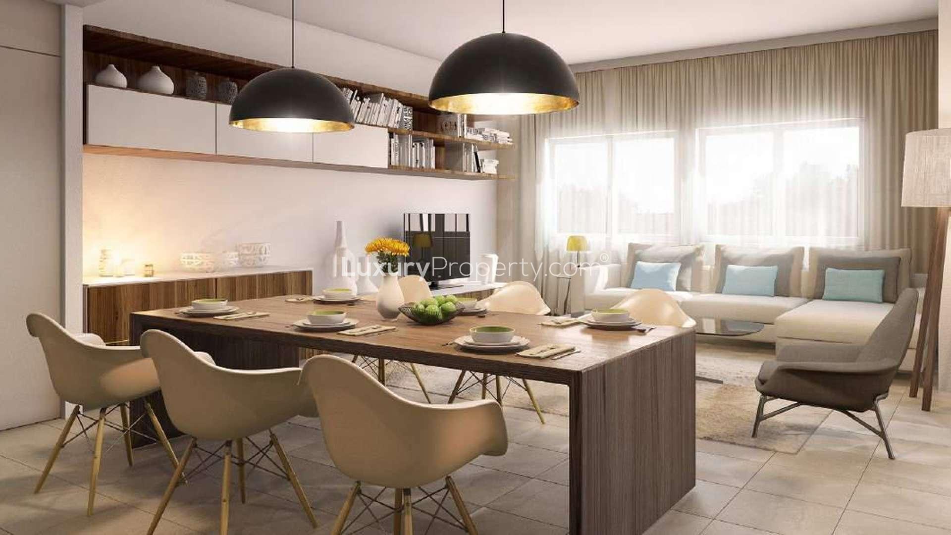 Elegant living and dining area in Safi Townhouses, Dubai Town Square, with modern decor