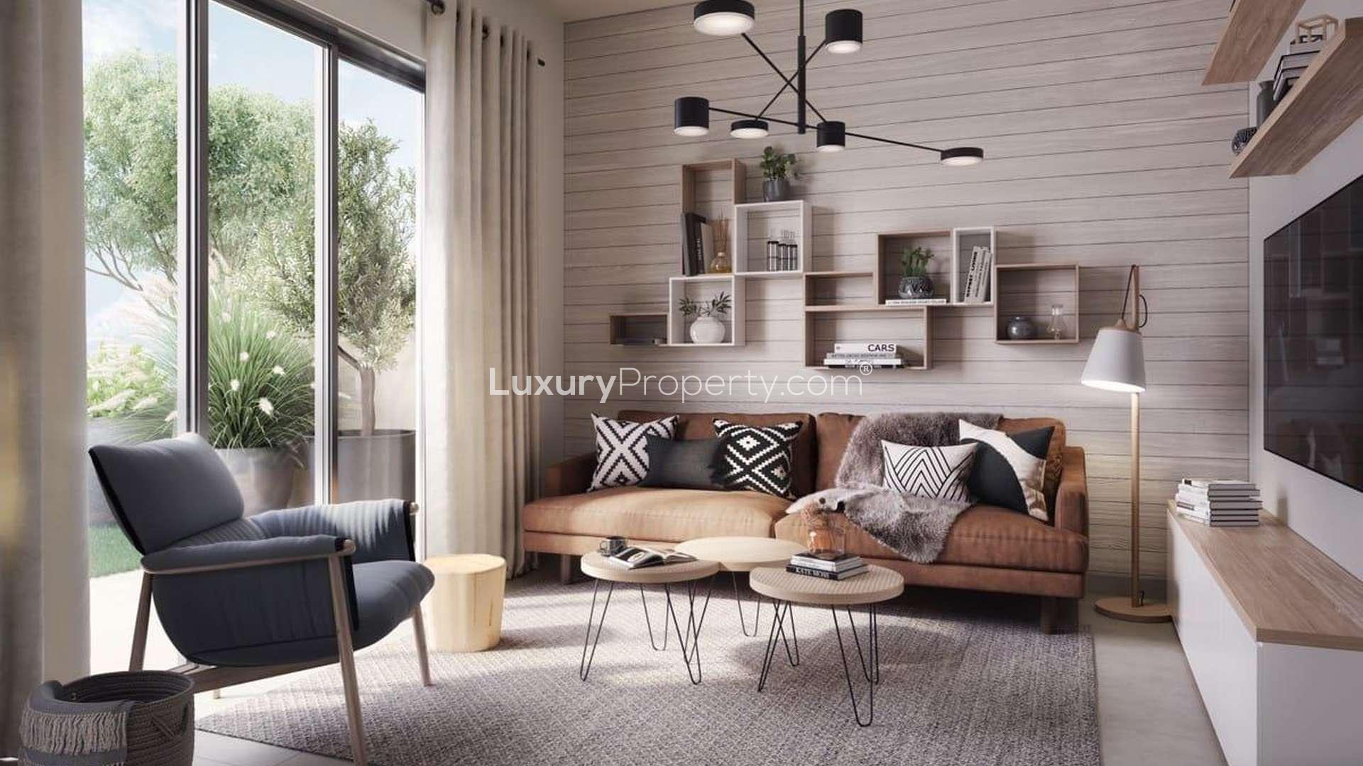 Stunning four-bedroom villa exterior at Expo Golf Villas, Emaar South with palm trees