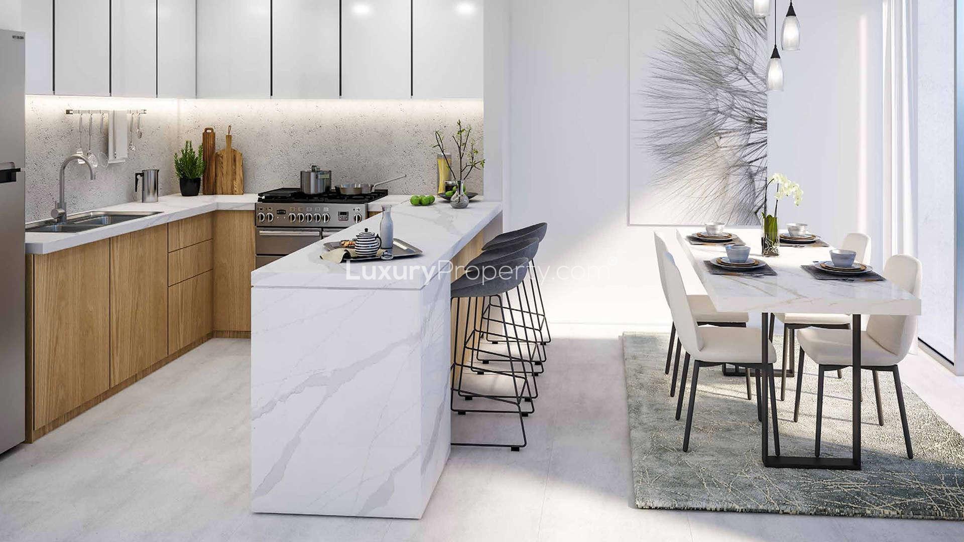 Modern kitchen and dining area in three-bedroom townhouse, Villanova, Dubailand