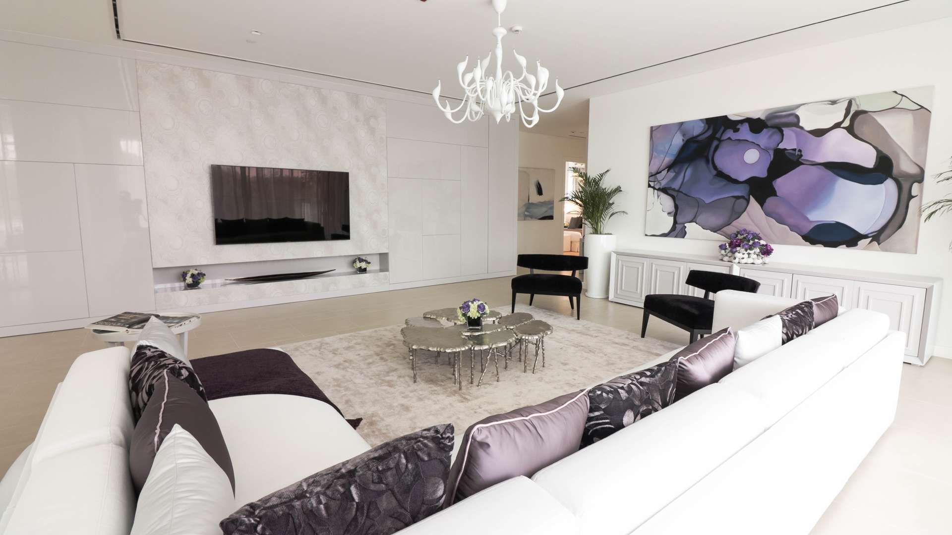 Modern living room in Al Barari's Seventh Heaven, featuring elegant decor and stylish furnishings