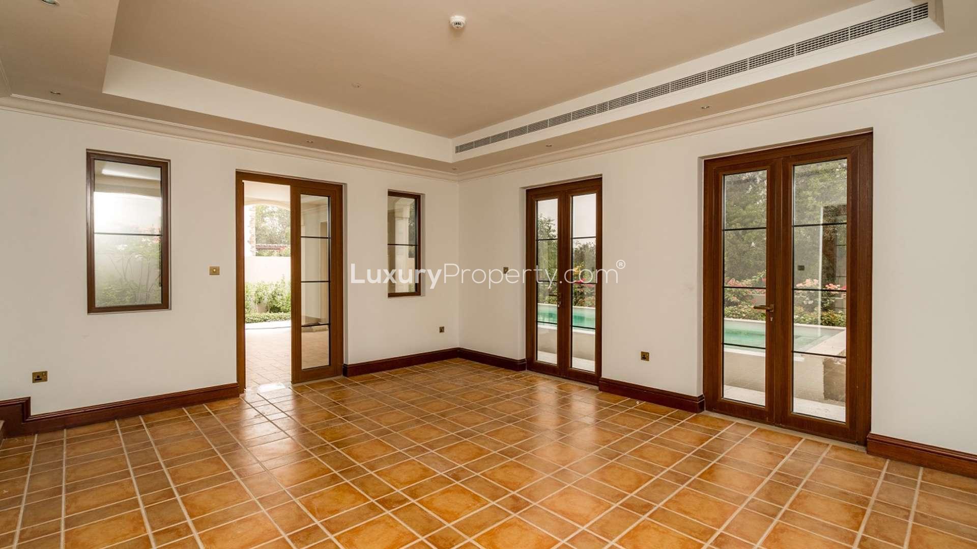 Hallway view in Zaragoza Villa, Lime Tree Valley, Jumeirah Golf Estates, with elegant tile flooring