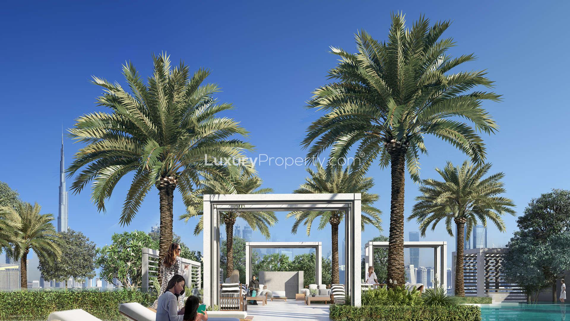 Luxurious Dubai Creek Harbour villa poolside with palm trees and skyline views