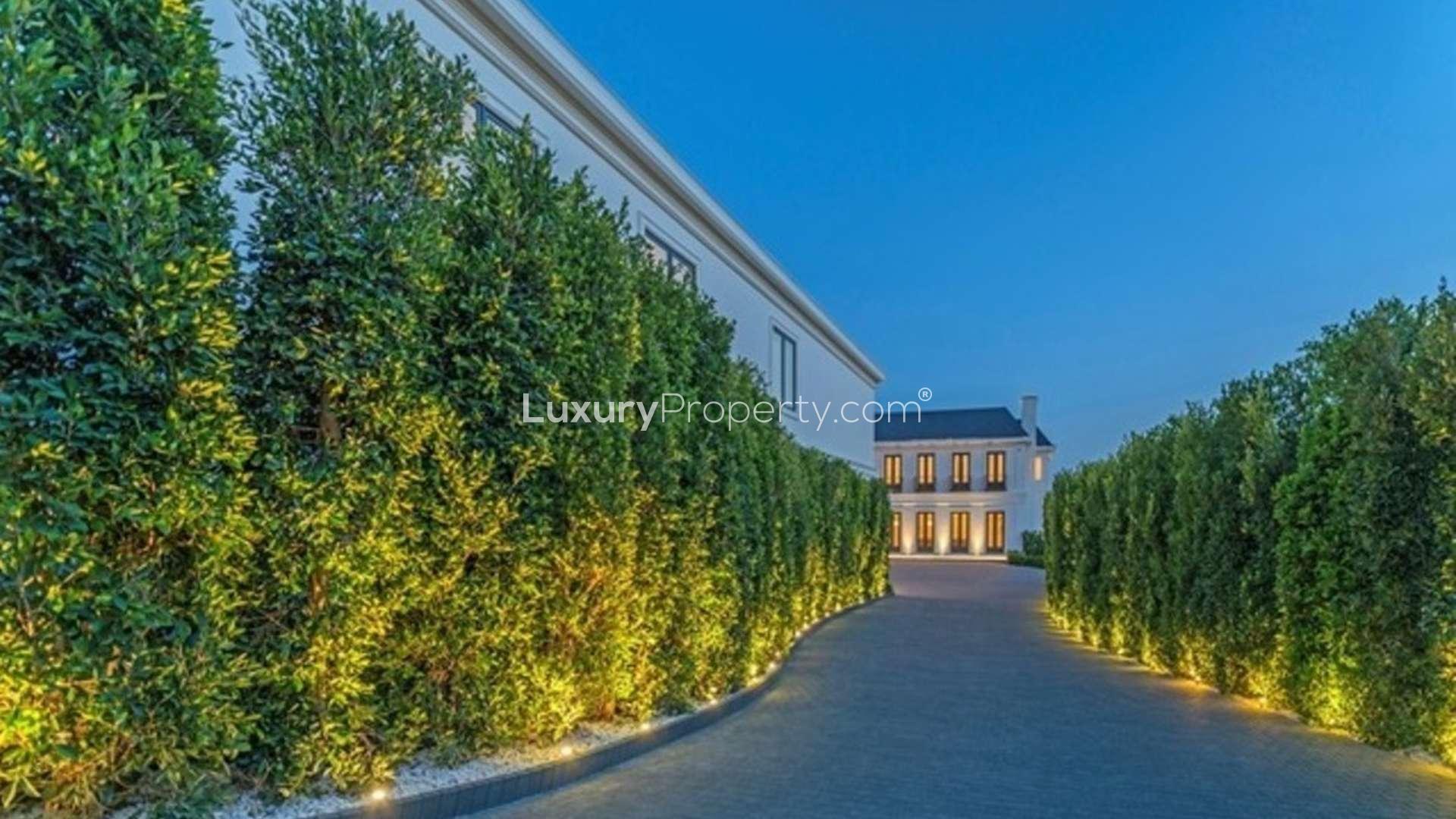 Indoor basketball court and tennis area in luxury Beverly Hills villa, Los Angeles estate