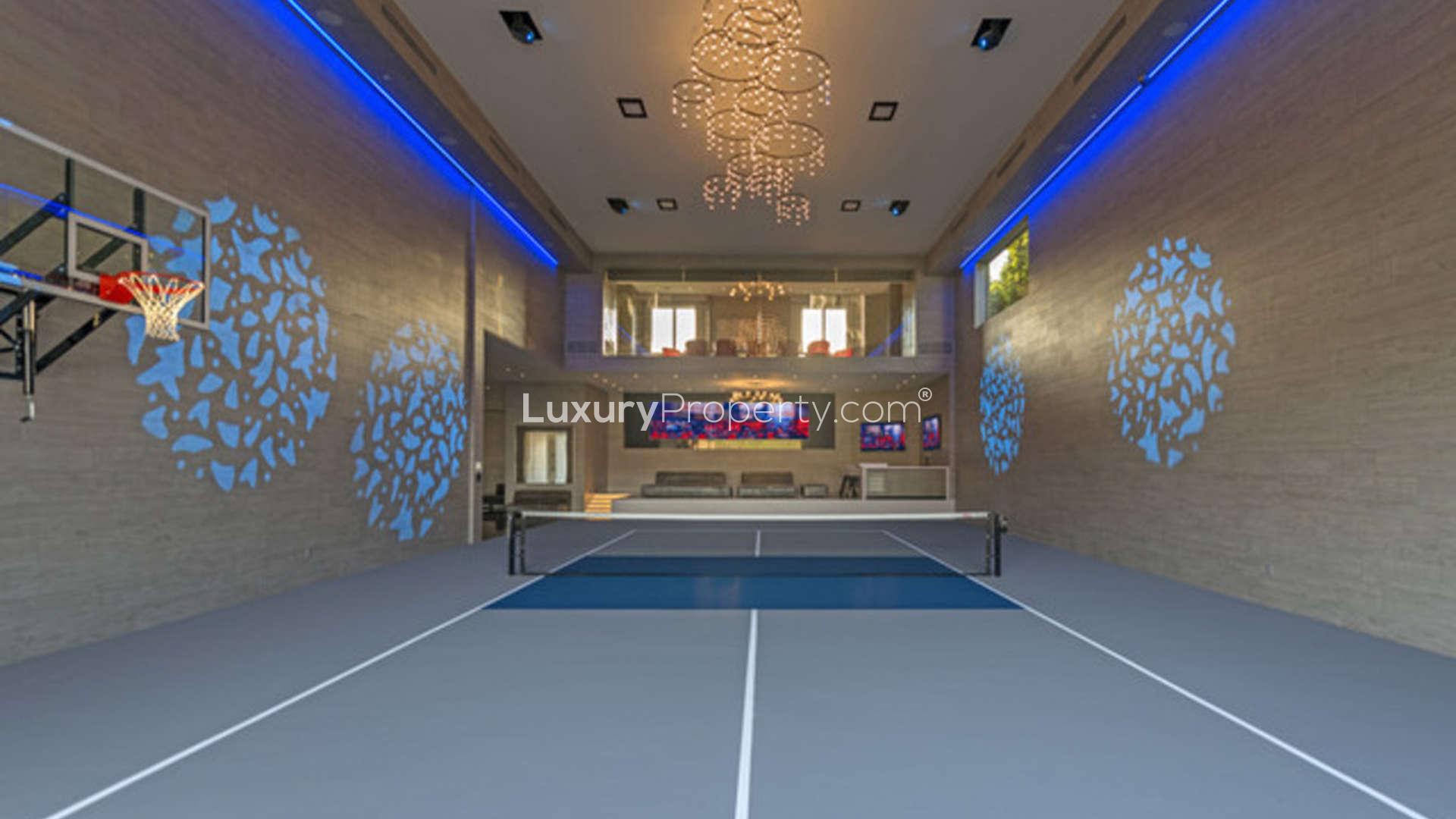 Luxurious living room with fireplace and bar at Beverly Hills villa, 2571 Wallingford Dr