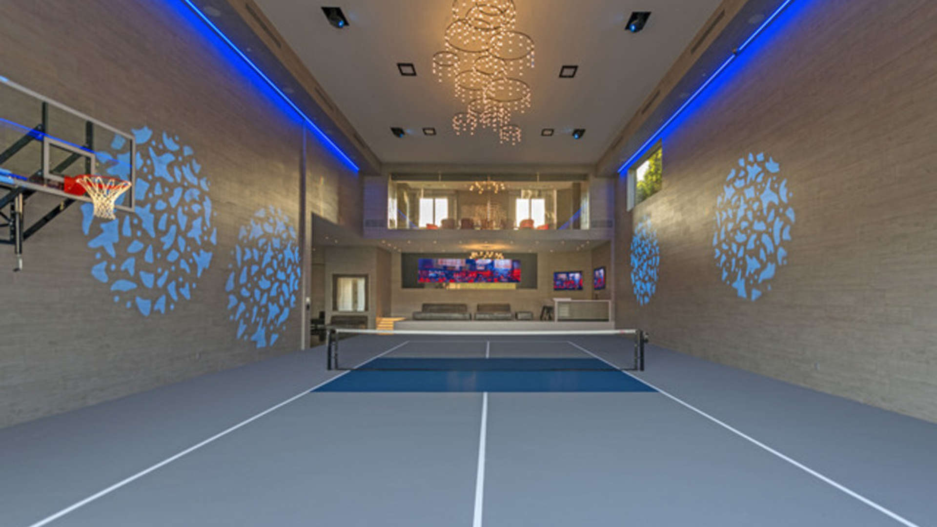 Luxurious living room with fireplace and bar at Beverly Hills villa, 2571 Wallingford Dr