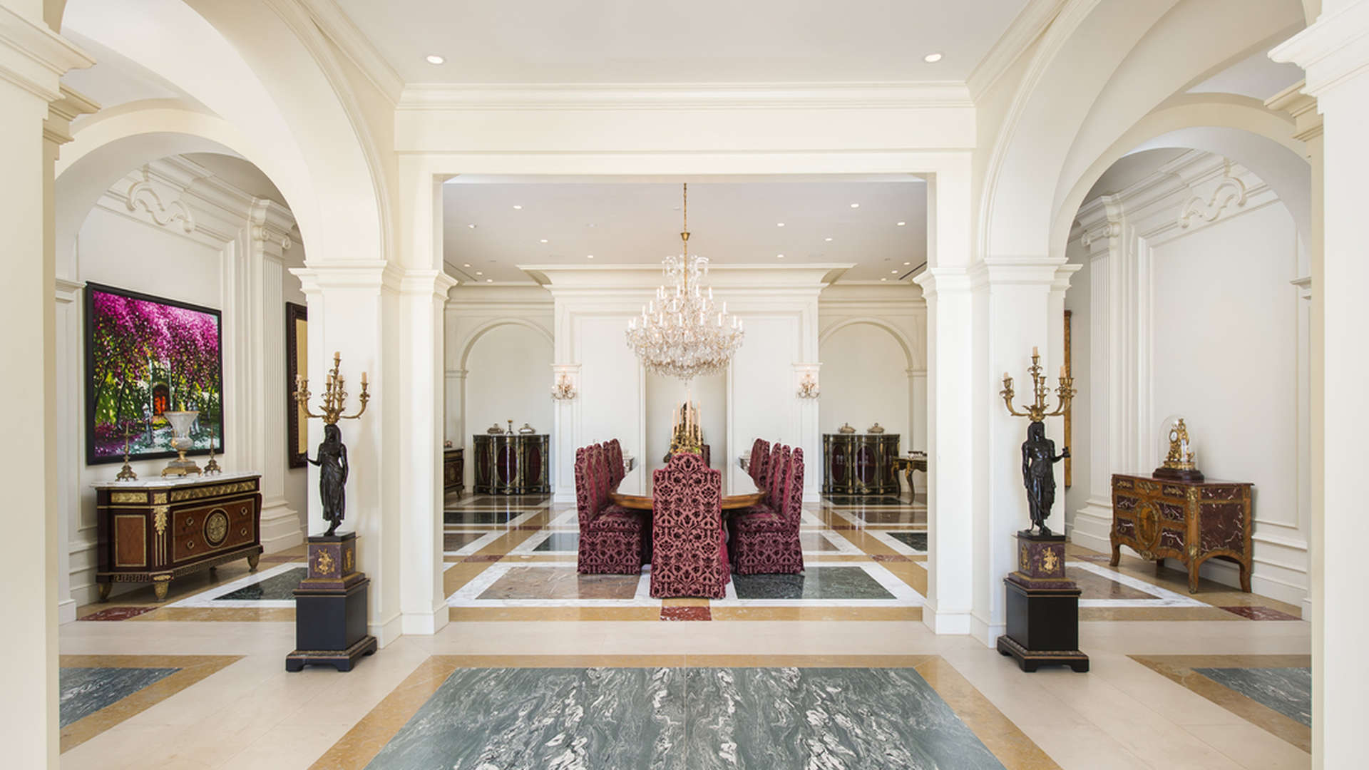 Luxurious Mediterranean-style villa foyer with grand staircase, Beverly Hills estate, 9505 Lania Ln
