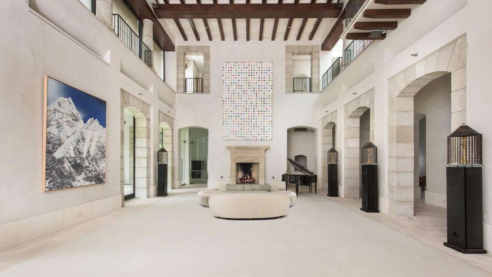 Luxurious 9-bedroom villa exterior with pool in Holmby Hills, Los Angeles at dusk