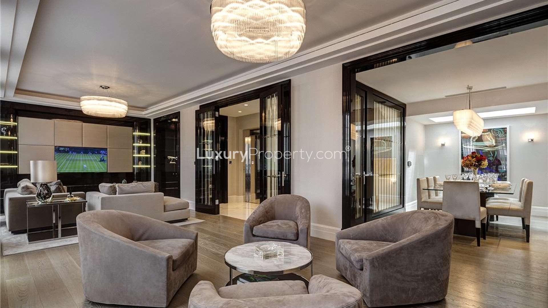 Luxurious living room in five-bedroom Mayfair townhouse with elegant decor and plush furnishings
