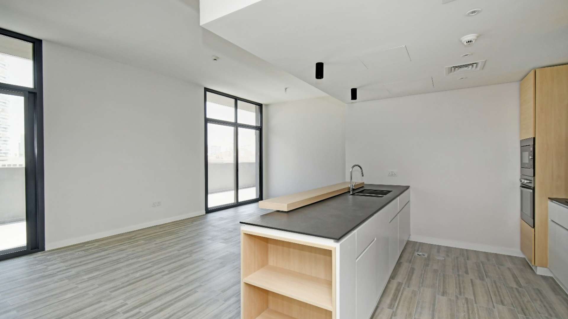 Modern kitchen in 2-bedroom apartment, Belgravia II, Jumeirah Village Circle, for sale