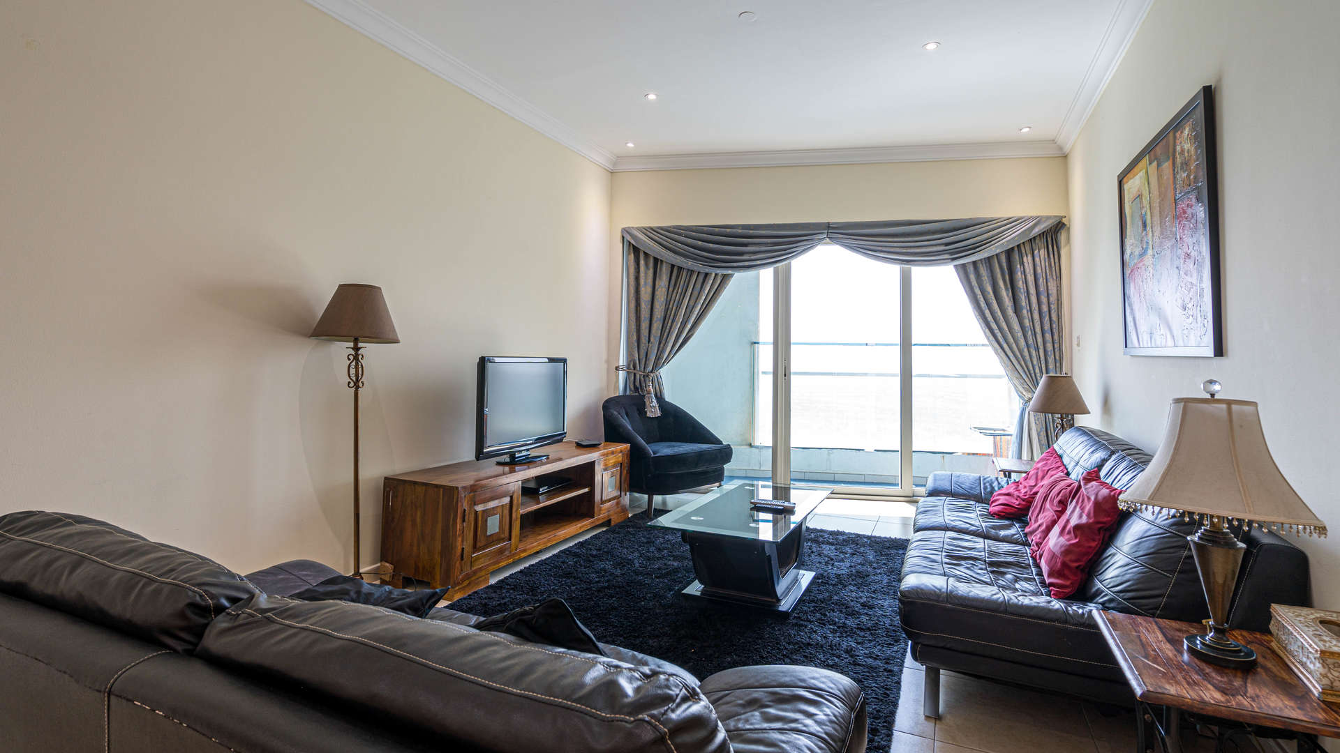 Furnished living room in three-bedroom Marina Heights apartment, Dubai Marina, for sale