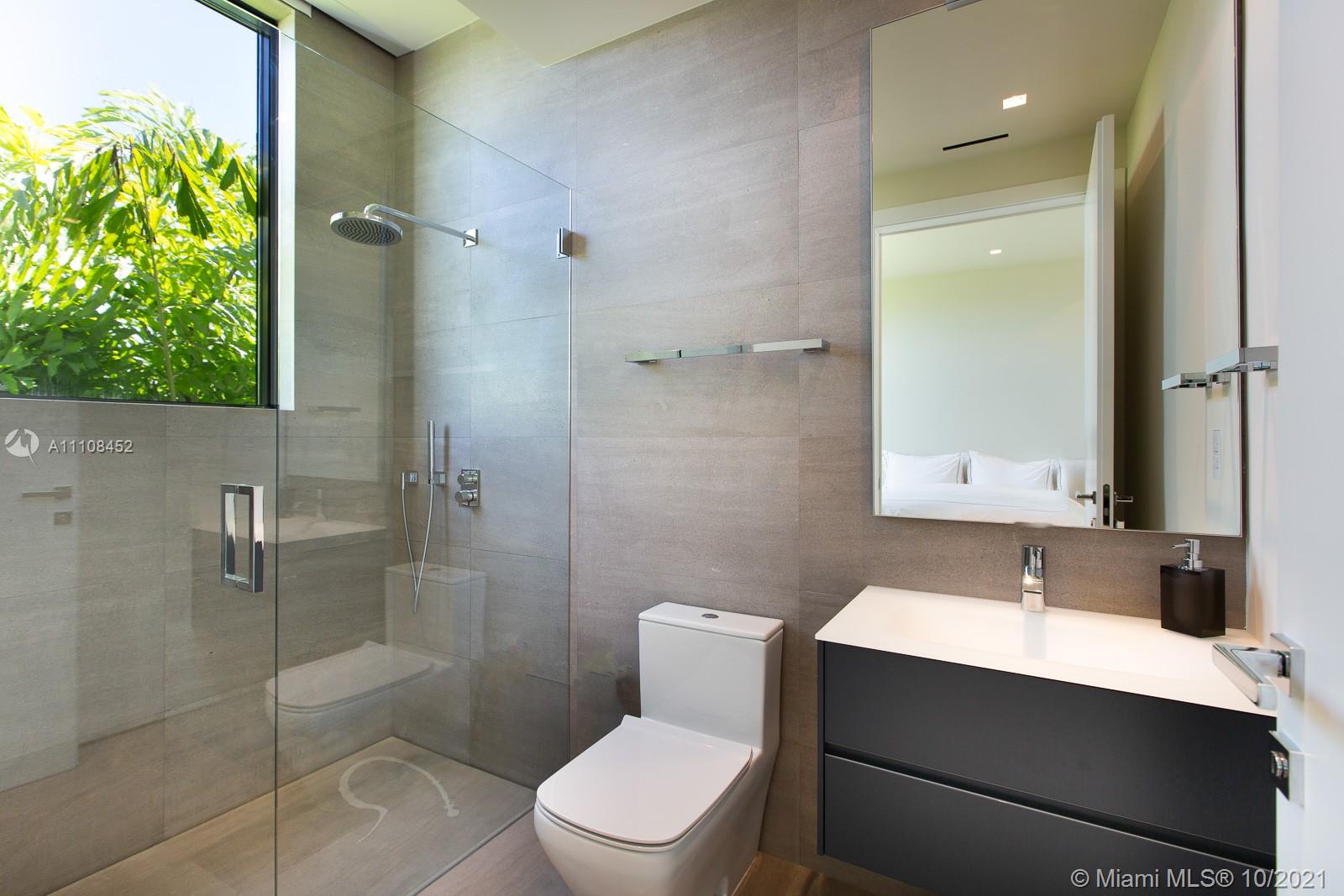 Luxurious bedroom with large windows in Miami waterfront villa, Ref LP09699