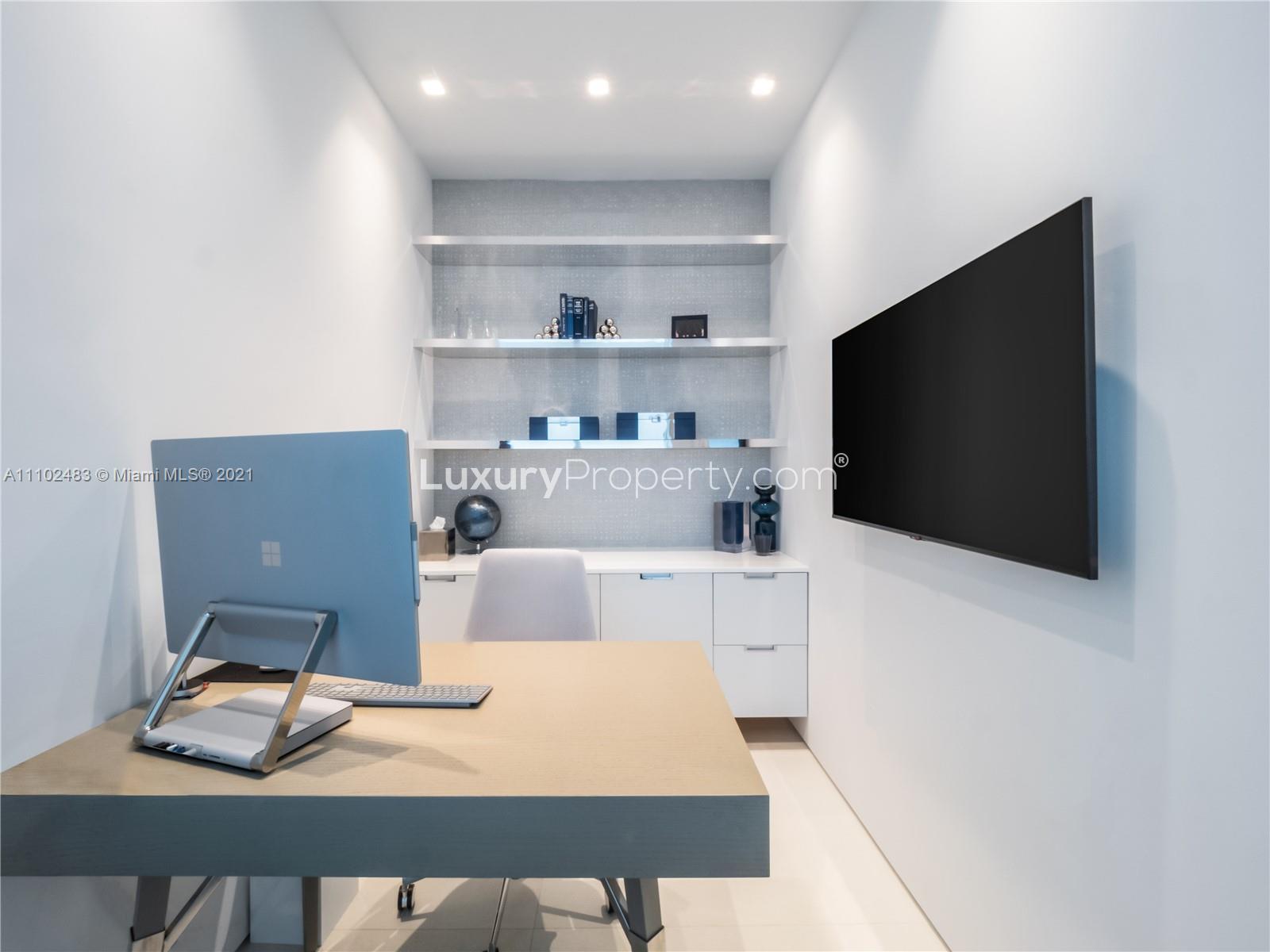 Modern oceanfront villa office with sea view at 50 S Pointe Dr, Miami