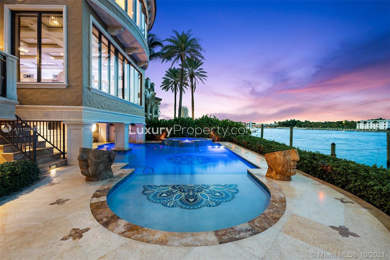 Luxurious Miami villa with pool and waterfront view at sunset, Pompano Beach